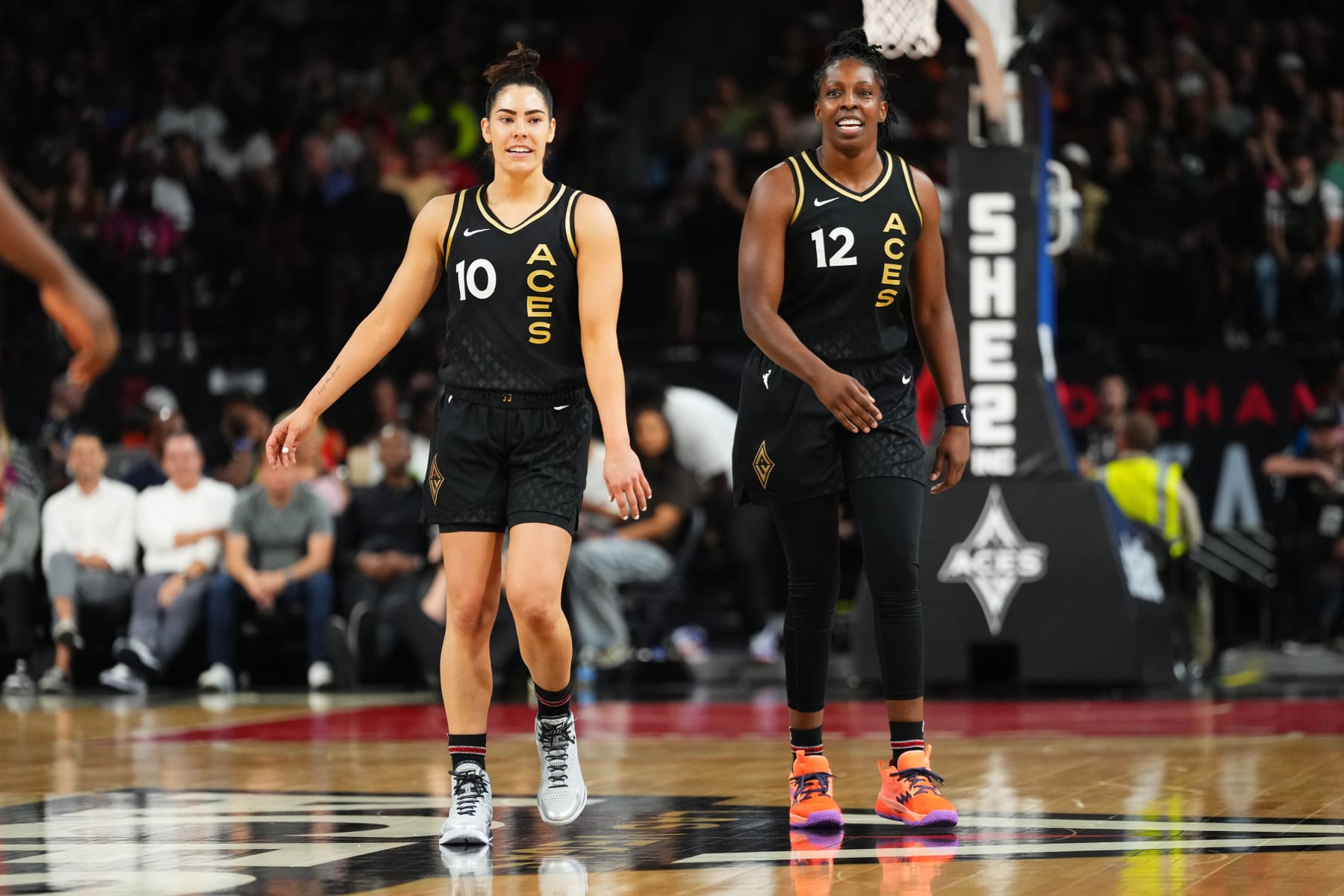 LAS VEGAS, NV - JULY 11: Kelsey Plum #10 and Chelsea Gray #12 of the Las Vegas Aces look on during the game against the Phoenix Mercury on July 11, 2023 at Michelob ULTRA Arena in Las Vegas, Nevada. NOTE TO USER: User expressly acknowledges and agrees that, by downloading and or using this photograph, User is consenting to the terms and conditions of the Getty Images License Agreement. Mandatory Copyright Notice: Copyright 2023 NBAE (Photo by Jeff Bottari/NBAE via Getty Images)