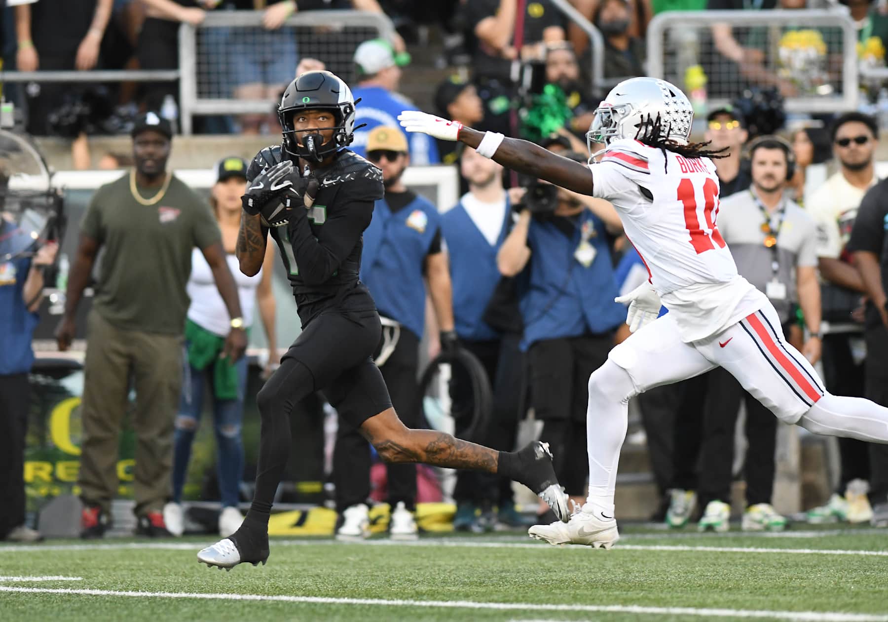 Ohio State cornerback Denzel Burke trailing in coverage against the Oregon Ducks.