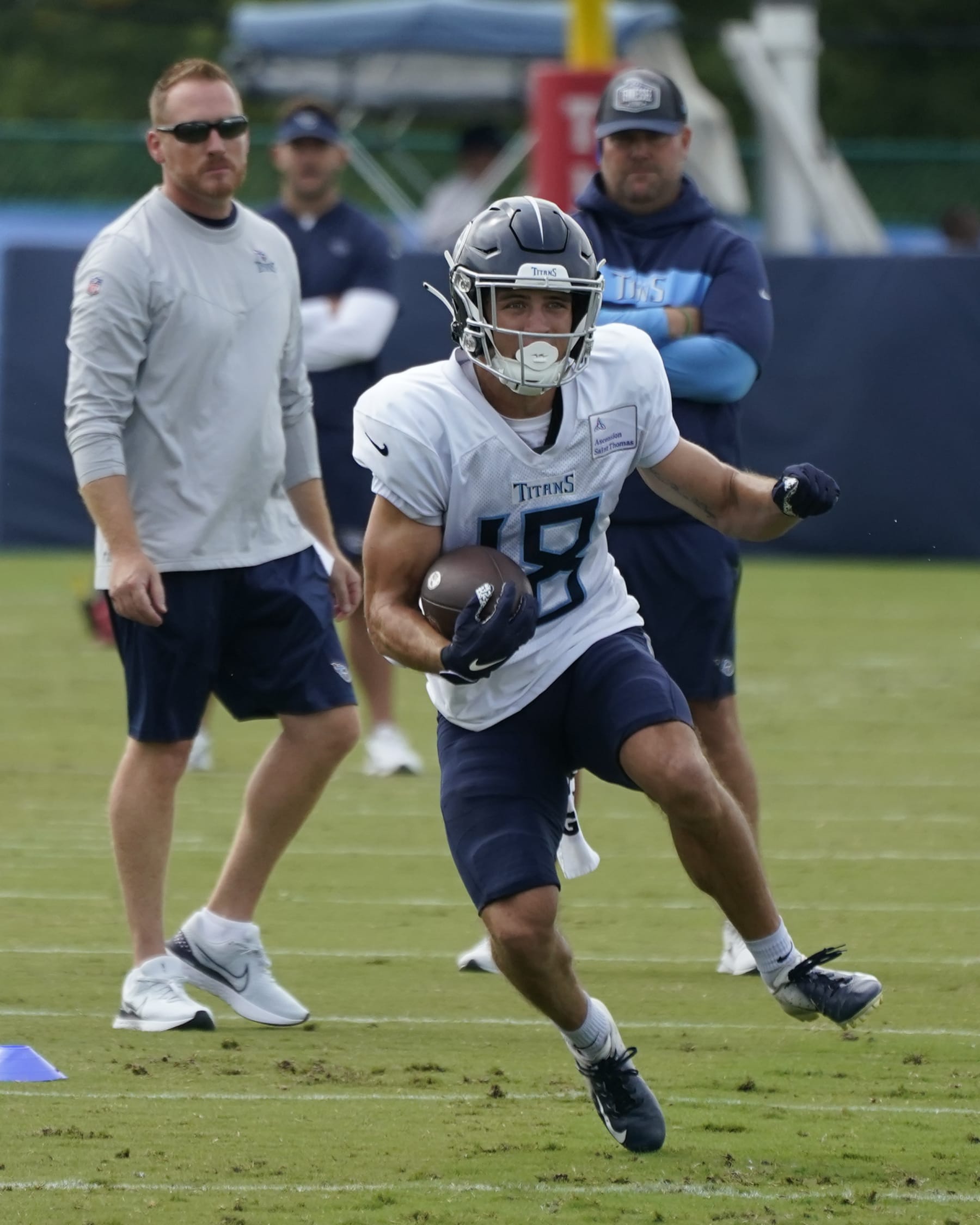 Tennessee Titans wide receiver Kyle Philips (18) takes part in drills during training camp at the NFL football team's practice facility Monday, Aug. 1, 2022, in Nashville, Tenn. (AP Photo/Mark Humphrey)