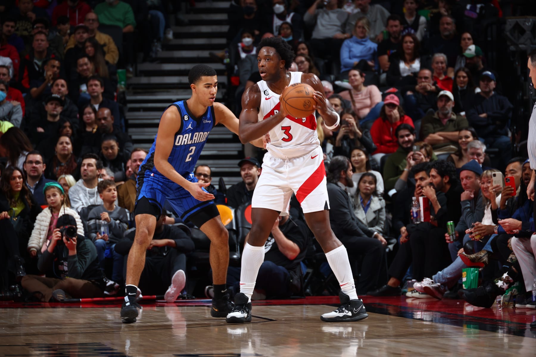 TORONTO, CANADA - DECEMBER 3: OG Anunoby #3 of the Toronto Raptors looks to pass the ball during the game against the Orlando Magic on December 3, 2022 at the Scotiabank Arena in Toronto, Ontario, Canada.  NOTE TO USER: User expressly acknowledges and agrees that, by downloading and or using this Photograph, user is consenting to the terms and conditions of the Getty Images License Agreement.  Mandatory Copyright Notice: Copyright 2022 NBAE (Photo by Vaughn Ridley/NBAE via Getty Images)