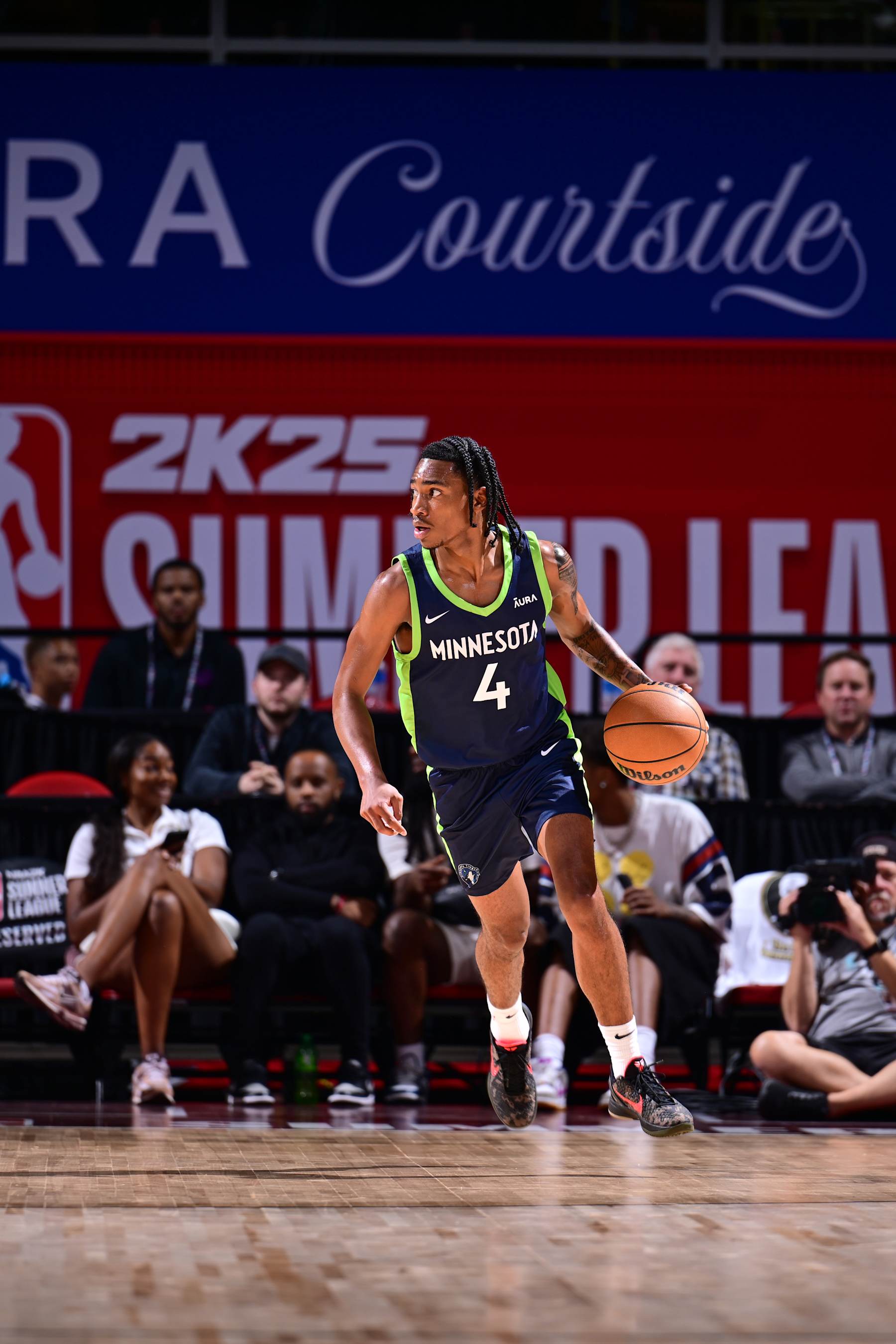 LAS VEGAS, NV - JULY 18:  Rob Dillingham #4 of the Minnesota Timberwolves handles the ball during the game  on July 18, 2024 at the Thomas & Mack Center in Las Vegas, Nevada. NOTE TO USER: User expressly acknowledges and agrees that, by downloading and or using this photograph, User is consenting to the terms and conditions of the Getty Images License Agreement. Mandatory Copyright Notice: Copyright 2024 NBAE (Photo by Adam Hagy/NBAE via Getty Images)