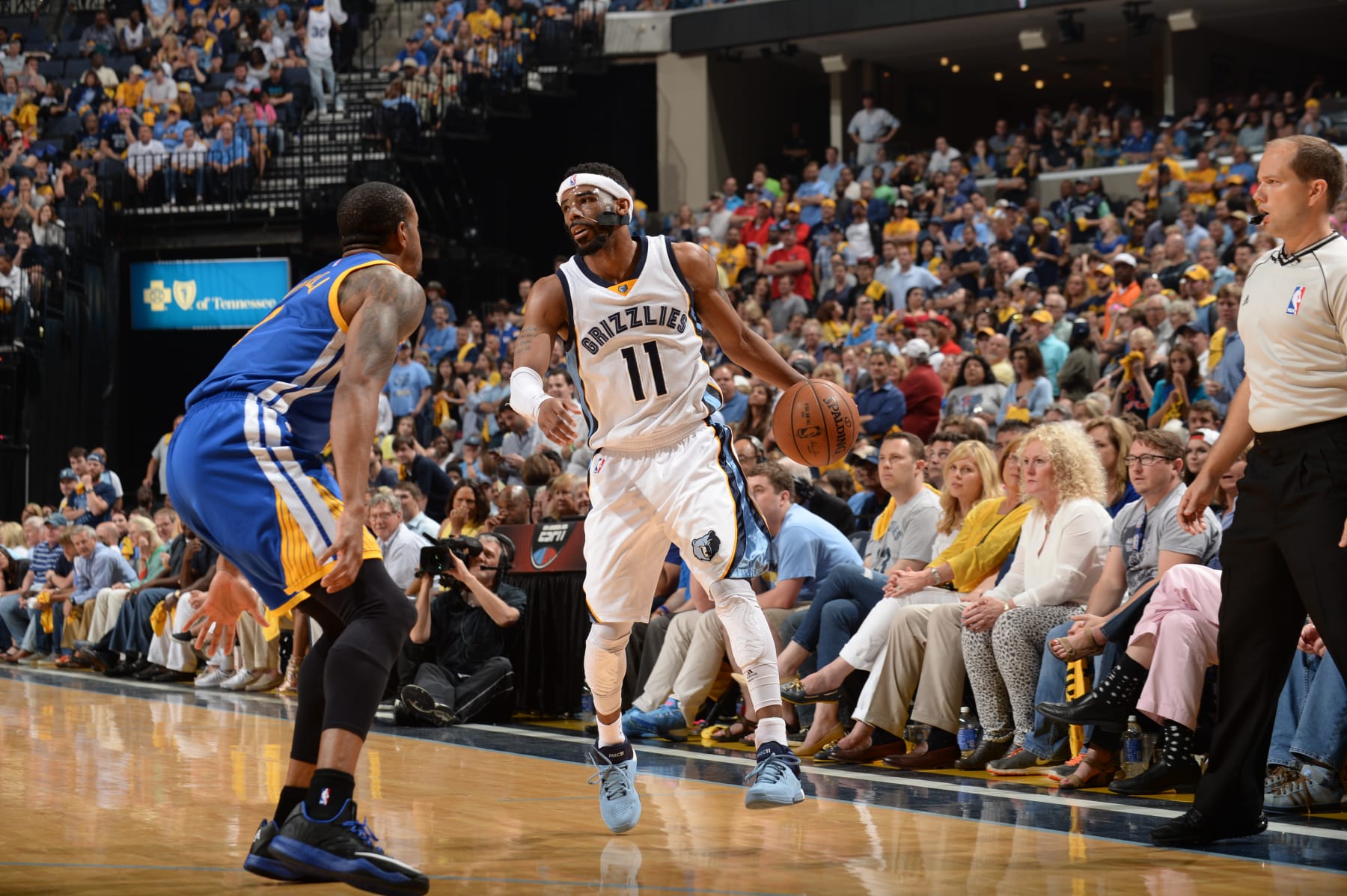MEMPHIS, TN - MAY 15:  Mike Conley #11 of the Memphis Grizzlies handles the ball against the Golden State Warriors in Game Six of the Western Conference Semifinals during the 2015 NBA Playoffs on May 15, 2015 at the FedExForum in Memphis, Tennessee.  NOTE TO USER: User expressly acknowledges and agrees that, by downloading and or using this Photograph, user is consenting to the terms and conditions of the Getty Images License Agreement. Mandatory Copyright Notice: Copyright 2015 NBAE (Photo by Noah Graham/NBAE via Getty Images)