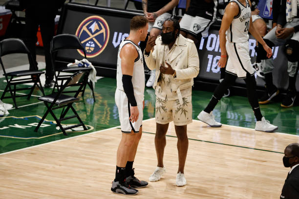 MILWAUKEE, WI - MAY 2: Blake Griffin #2 talks with James Harden #13 of the Brooklyn Nets during the game against the Milwaukee Bucks on May 2, 2021 at the Fiserv Forum Center in Milwaukee, Wisconsin. NOTE TO USER: User expressly acknowledges and agrees that, by downloading and or using this Photograph, user is consenting to the terms and conditions of the Getty Images License Agreement. Mandatory Copyright Notice: Copyright 2021 NBAE (Photo by Kamil Krzaczynski/NBAE via Getty Images).