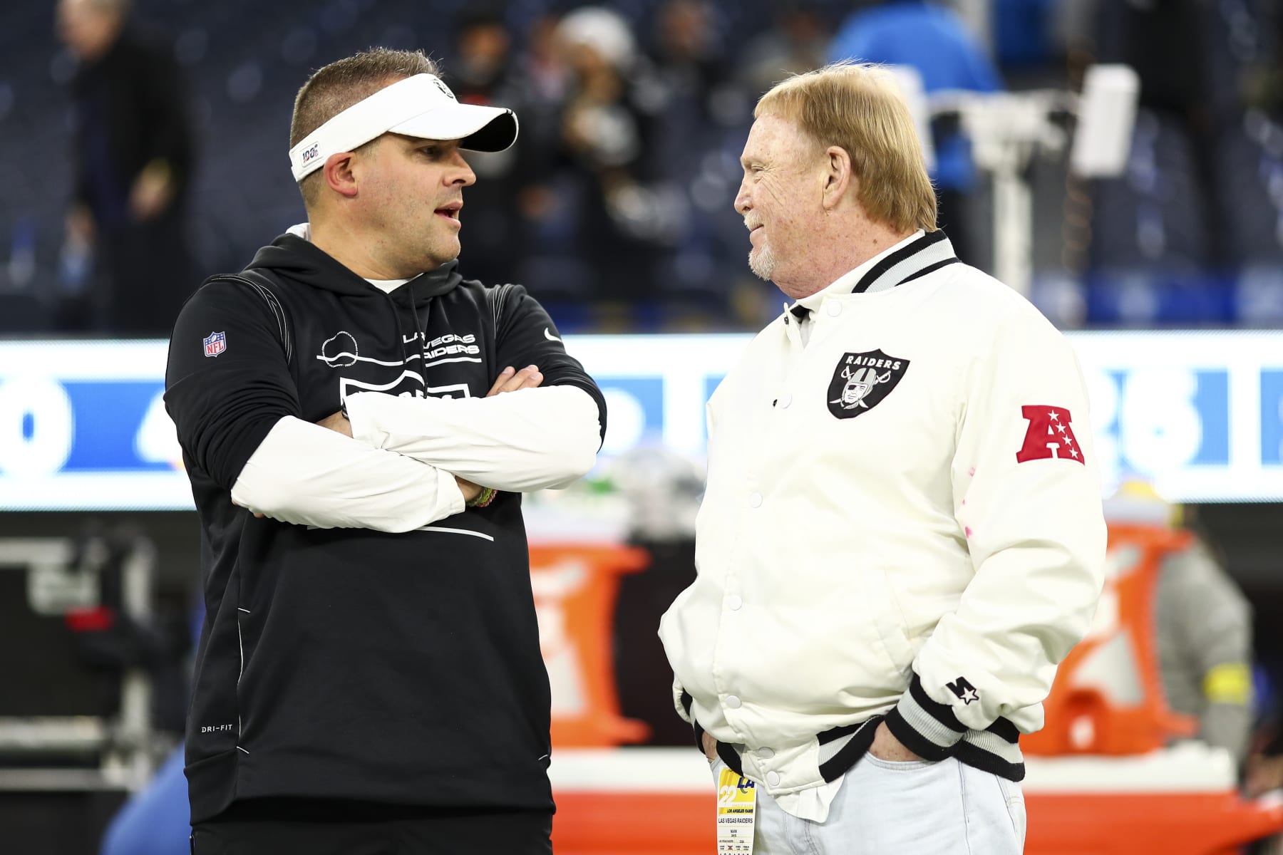 INGLEWOOD, CA - DECEMBER 8: Head coach Josh McDaniels of the Las Vegas Raiders talks with owner and managing general partner Mark Davis on the sidelines prior to an NFL football game against the Los Angeles Rams at SoFi Stadium on December 8, 2022 in Inglewood, California. (Photo by Kevin Sabitus/Getty Images)