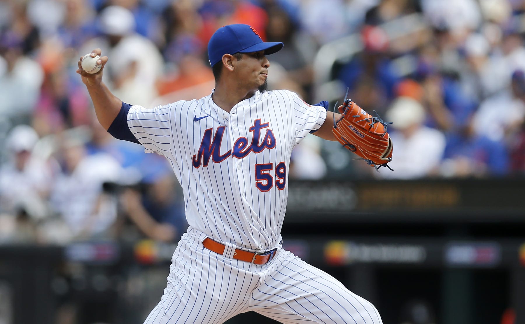 NEW YORK, NEW YORK - SEPTEMBER 04:  Carlos Carrasco #59 of the New York Mets pitches during the second inning against the Washington Nationals at Citi Field on September 04, 2022 in New York City. (Photo by Jim McIsaac/Getty Images)