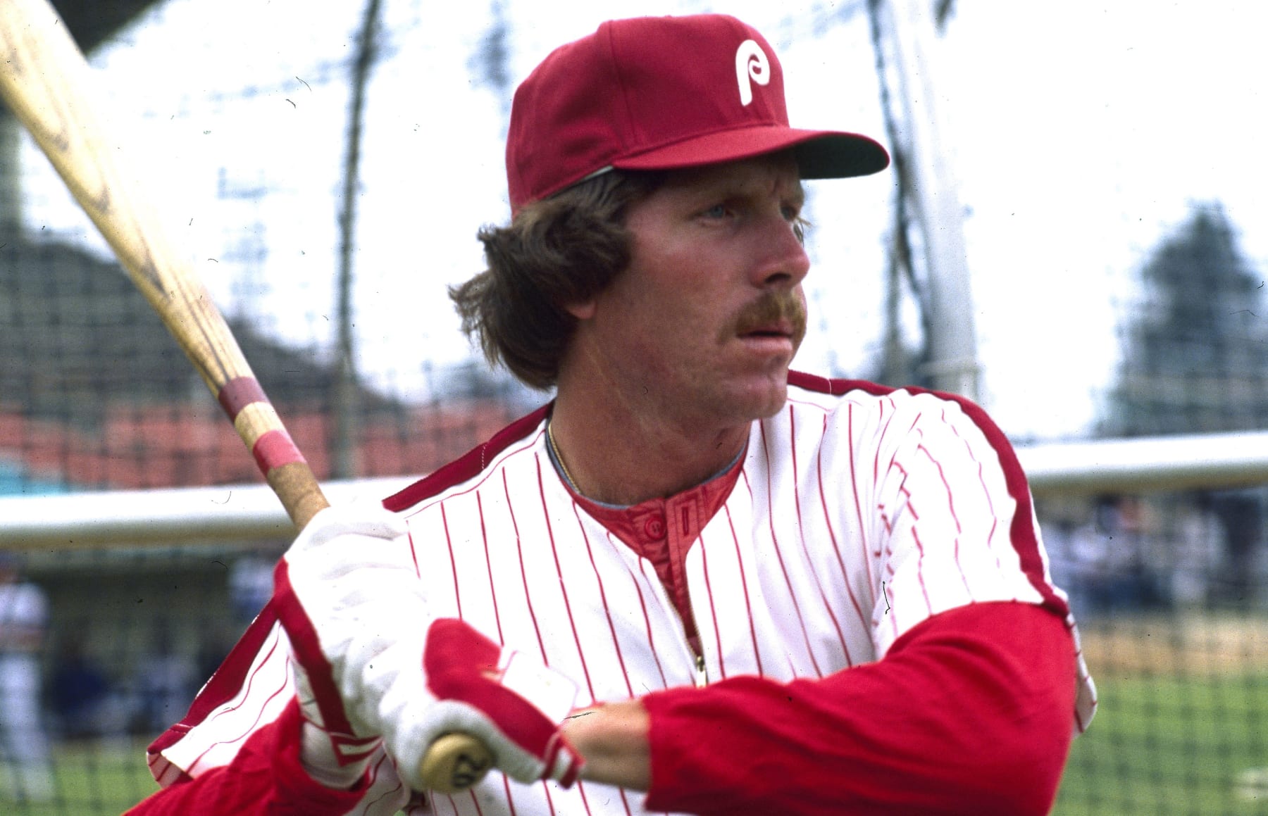 FILE - In this 1981 file photo, Philadelphia Phillies' Mike Schmidt holds a baseball bat. Schmidt is eager to see outfielder Bryce Harper lead the Phillies into a new era. (AP Photo/File)