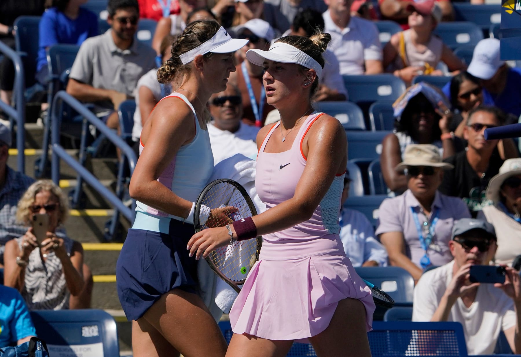 Belarus' Victoria Azarenka (R) plays against Ukraine's Marta Kostyuk during their 2022 US Open Tennis tournament women's singles second round match at the USTA Billie Jean King National Tennis Center in New York, on September 1, 2022. (Photo by TIMOTHY A. CLARY / AFP) (Photo by TIMOTHY A. CLARY/AFP via Getty Images)