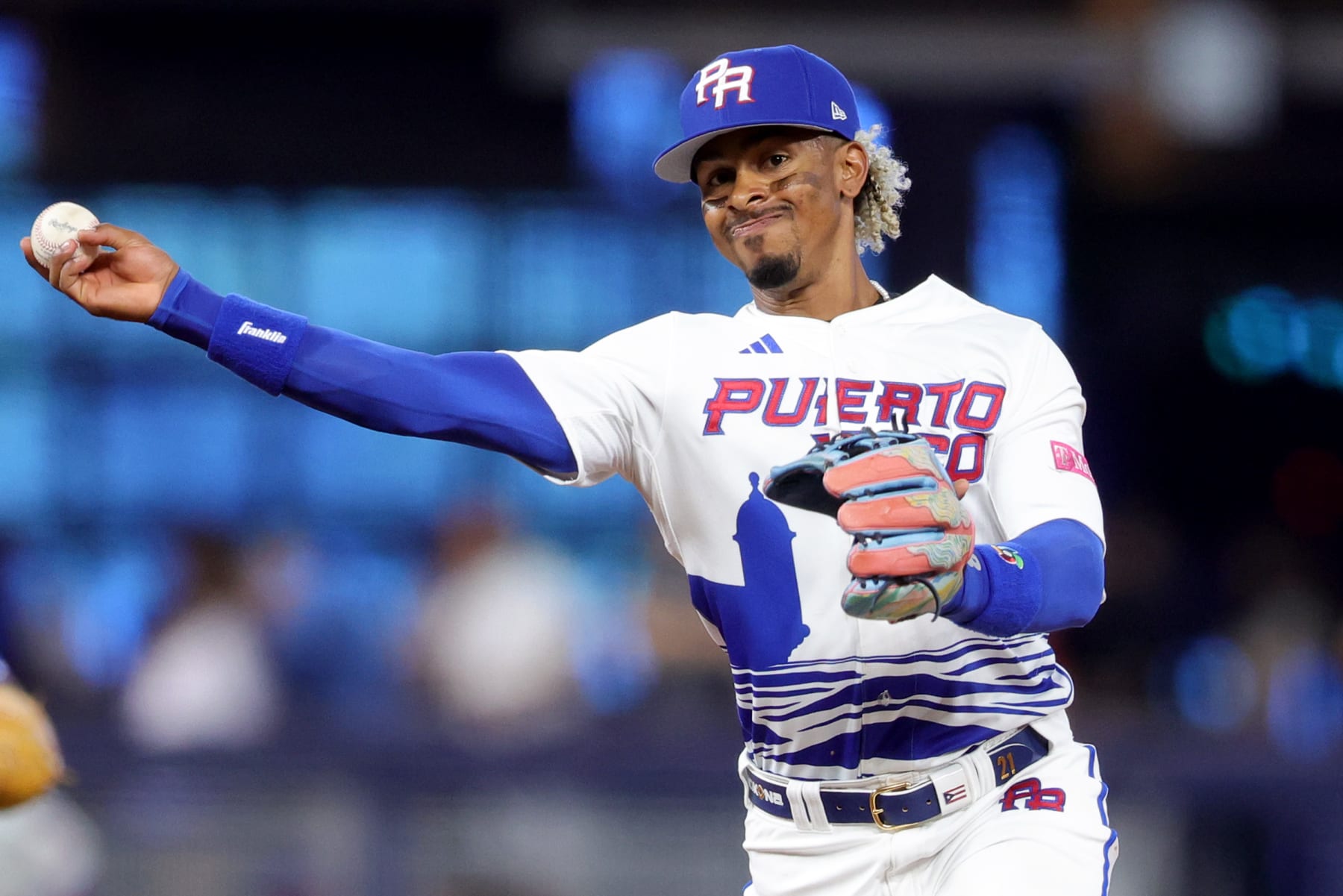 MIAMI, FLORIDA - MARCH 11: Francisco Lindor #12 of Team Puerto Rico throws to first base to force an out against Team Nicaragua during the second inning at loanDepot park on March 11, 2023 in Miami, Florida. (Photo by Megan Briggs/Getty Images)