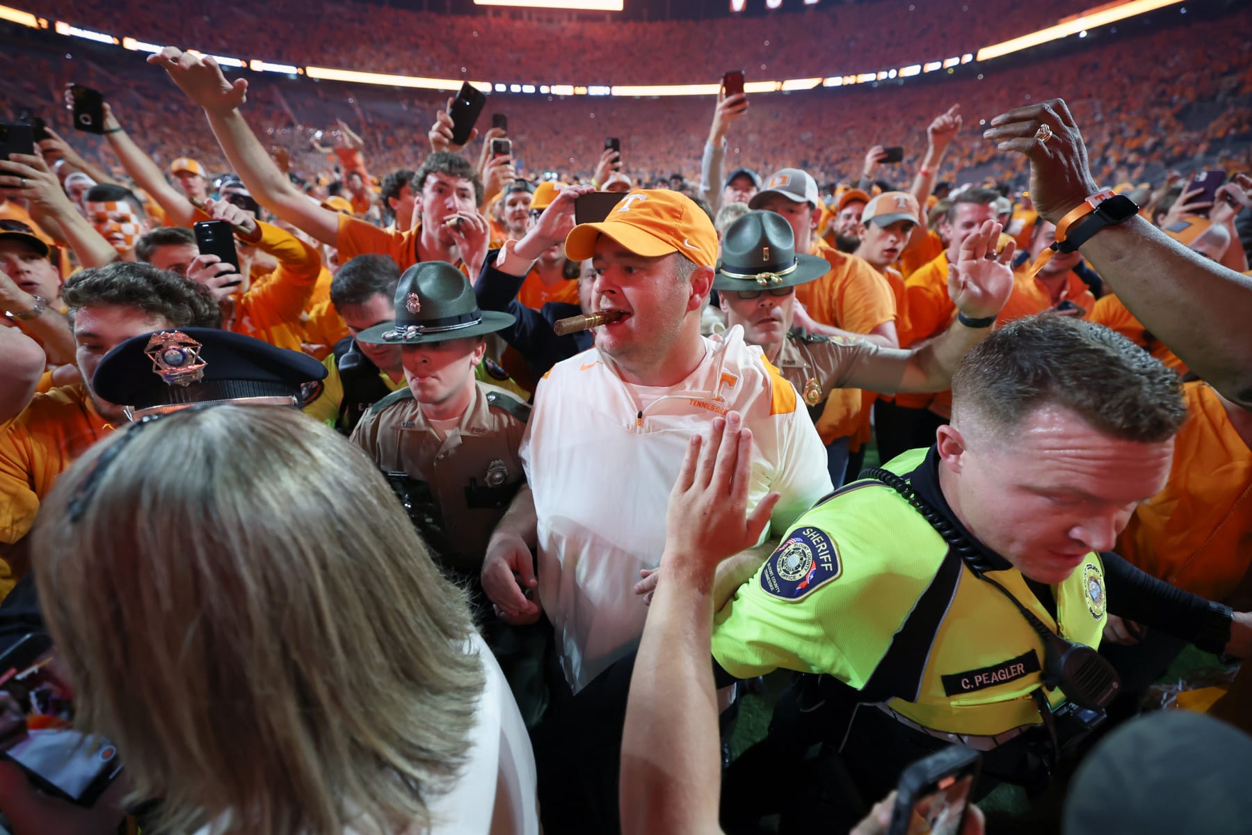 KNOXVILLE, TENNESSEE - OCTOBER 15: Head coach Josh Heupel of the Tennessee Volunteers celebrates a win over the Alabama Crimson Tide with a cigar at Neyland Stadium on October 15, 2022 in Knoxville, Tennessee. Tennessee won the game 52-49. (Photo by Donald Page/Getty Images)