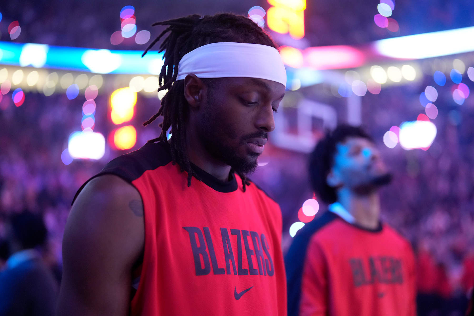 PORTLAND, OREGON - DECEMBER 28: Jerami Grant #9 of the Portland Trail Blazers stands for the National Anthem before the game against the Dallas Mavericks at Moda Center on December 28, 2024 in Portland, Oregon. NOTE TO USER: User expressly acknowledges and agrees that, by downloading and or using this photograph, User is consenting to the terms and conditions of the Getty Images License Agreement. (Photo by Soobum Im/Getty Images)