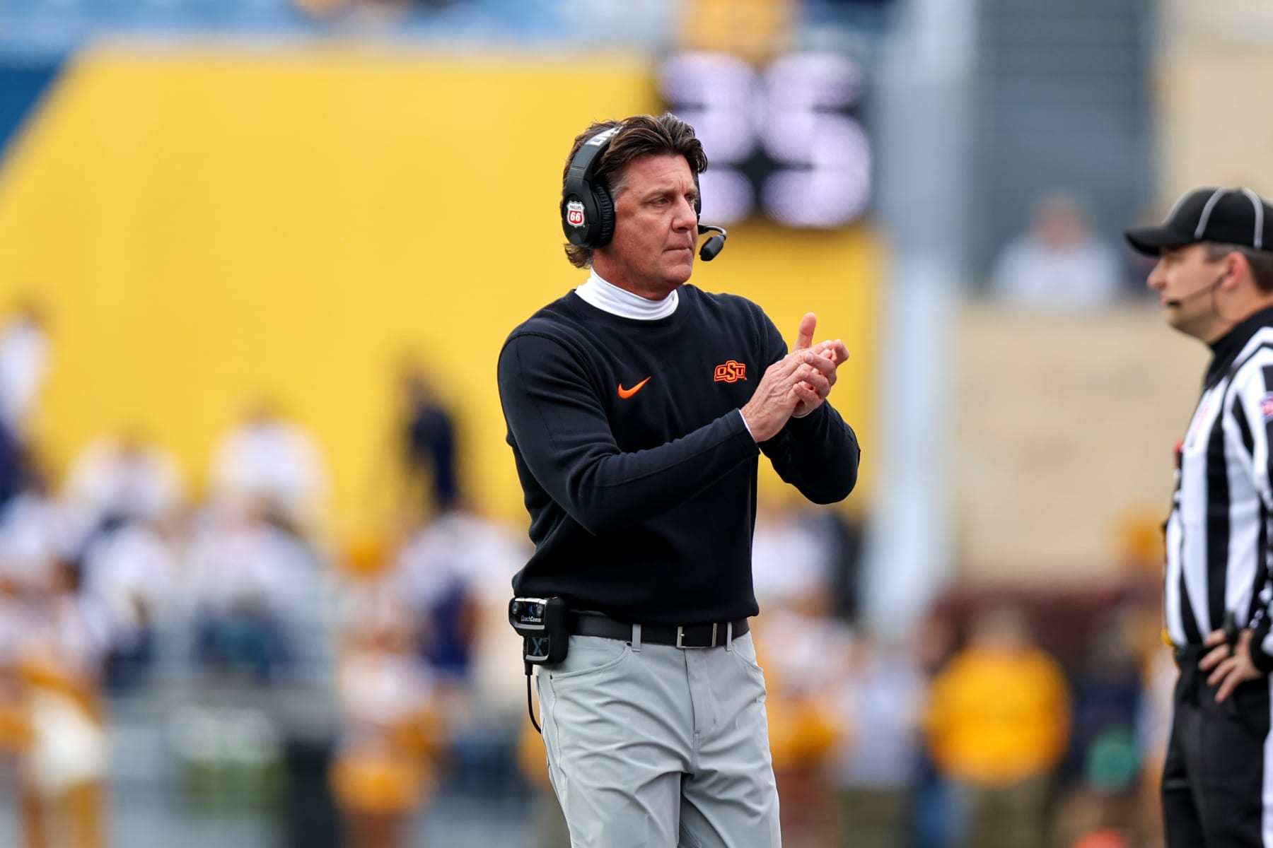 MORGANTOWN, WV - OCTOBER 21: Oklahoma State Cowboys head coach Mike Gundy on the sideline during the first quarter of the college football game between the Oklahoma State Cowboys and the West Virginia Mountaineers on October 21, 2023, at Mountaineer Field at Milan Puskar Stadium in Morgantown, WV.  (Photo by Frank Jansky/Icon Sportswire via Getty Images)