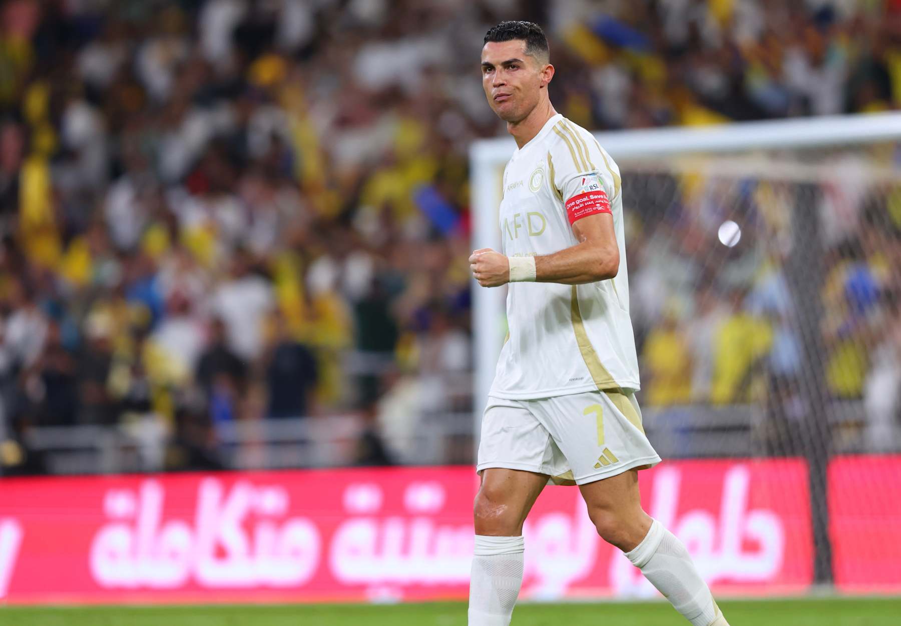 JEDDAH, SAUDI ARABIA - DECEMBER 06: Cristiano Ronaldo of Al Nassr celebrates after scoring the first goal of his team during the Saudi Pro League match between Al-Ittihad v Al-Nassr at King Abdullah Sports City on December 06, 2024 in Jeddah, Saudi Arabia. (Photo by Al Nassr FC/Al Nassr FC via Getty Images)
