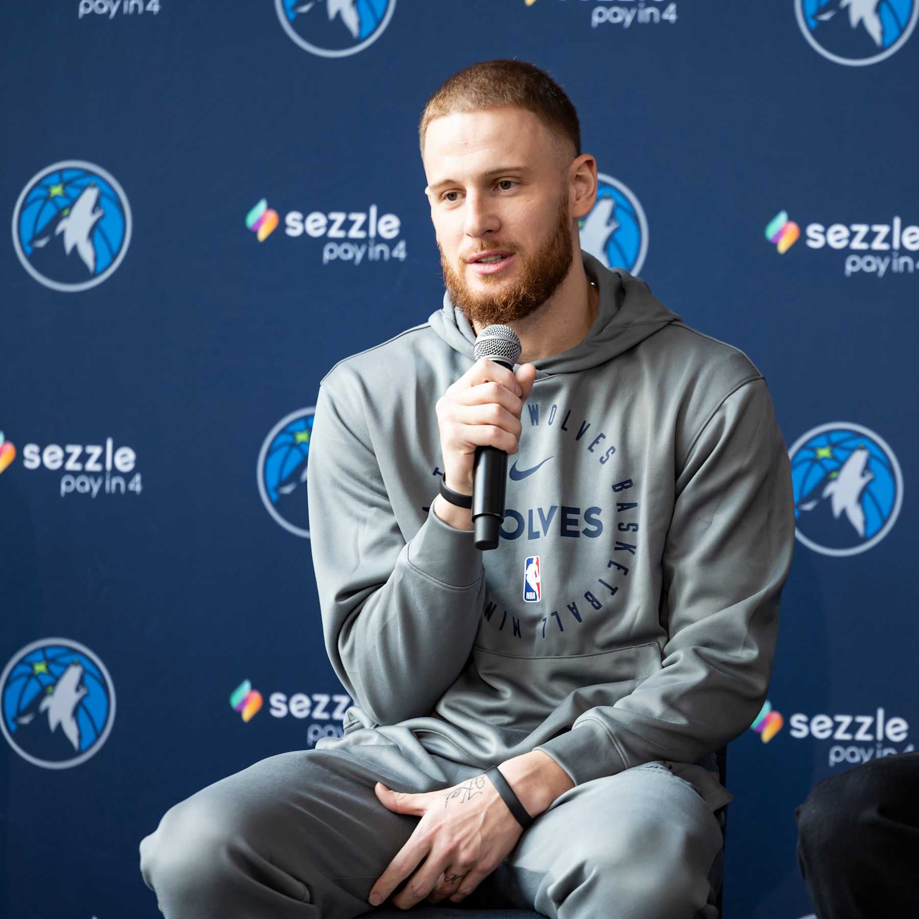 MINNEAPOLIS, MN - OCTOBER 3: Donte DiVincenzo #00 of the Minnesota Timberwolves speaks during a press conference on October 3, 2024 at Target Center in Minneapolis, Minnesota. NOTE TO USER: User expressly acknowledges and agrees that, by downloading and or using this Photograph, user is consenting to the terms and conditions of the Getty Images License Agreement. Mandatory Copyright Notice: Copyright 2024 NBAE (Photo by David Sherman/NBAE via Getty Images)