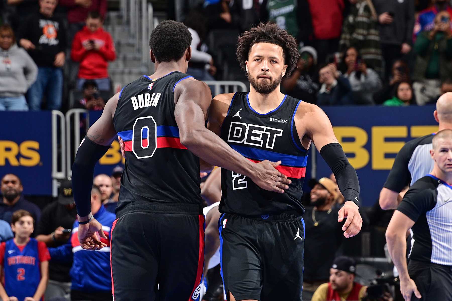 DETROIT, MI - NOVEMBER 12: Jalen Duren #0 and Cade Cunningham #2 of the Detroit Pistons celebrate against the Miami Heat during the Emirates NBA Cup game on November 12, 2024 at Little Caesars Arena in Detroit, Michigan. NOTE TO USER: User expressly acknowledges and agrees that, by downloading and/or using this photograph, User is consenting to the terms and conditions of the Getty Images License Agreement. Mandatory Copyright Notice: Copyright 2024 NBAE (Photo by Chris Schwegler/NBAE via Getty Images)