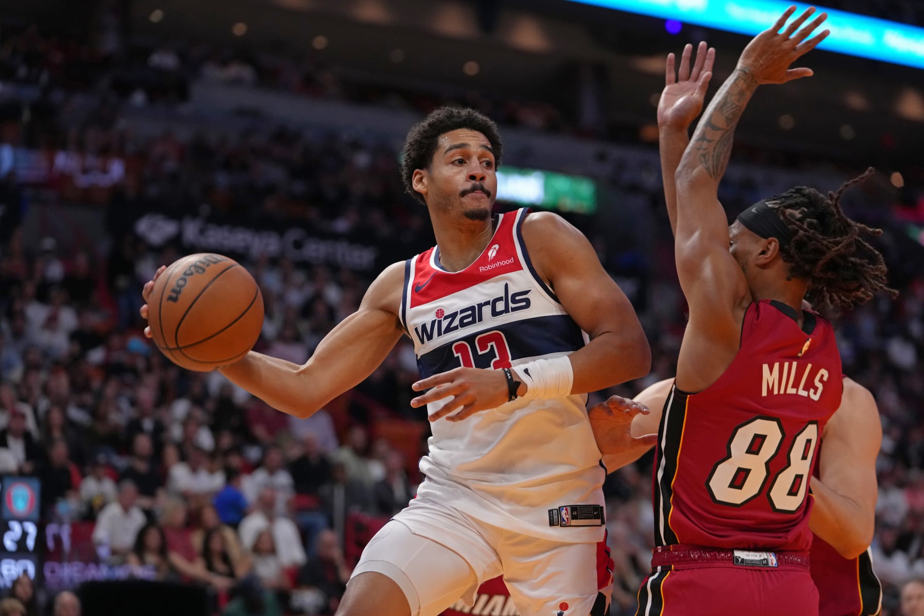 MIAMI, FL - MARCH 10: Jordan Poole #13 of the Washington Wizards passes the ball during the game against the Miami Heat on March 10, 2024 at Kaseya Center in Miami, Florida. NOTE TO USER: User expressly acknowledges and agrees that, by downloading and or using this Photograph, user is consenting to the terms and conditions of the Getty Images License Agreement. Mandatory Copyright Notice: Copyright 2024 NBAE (Photo by Eric Espada/NBAE via Getty Images)