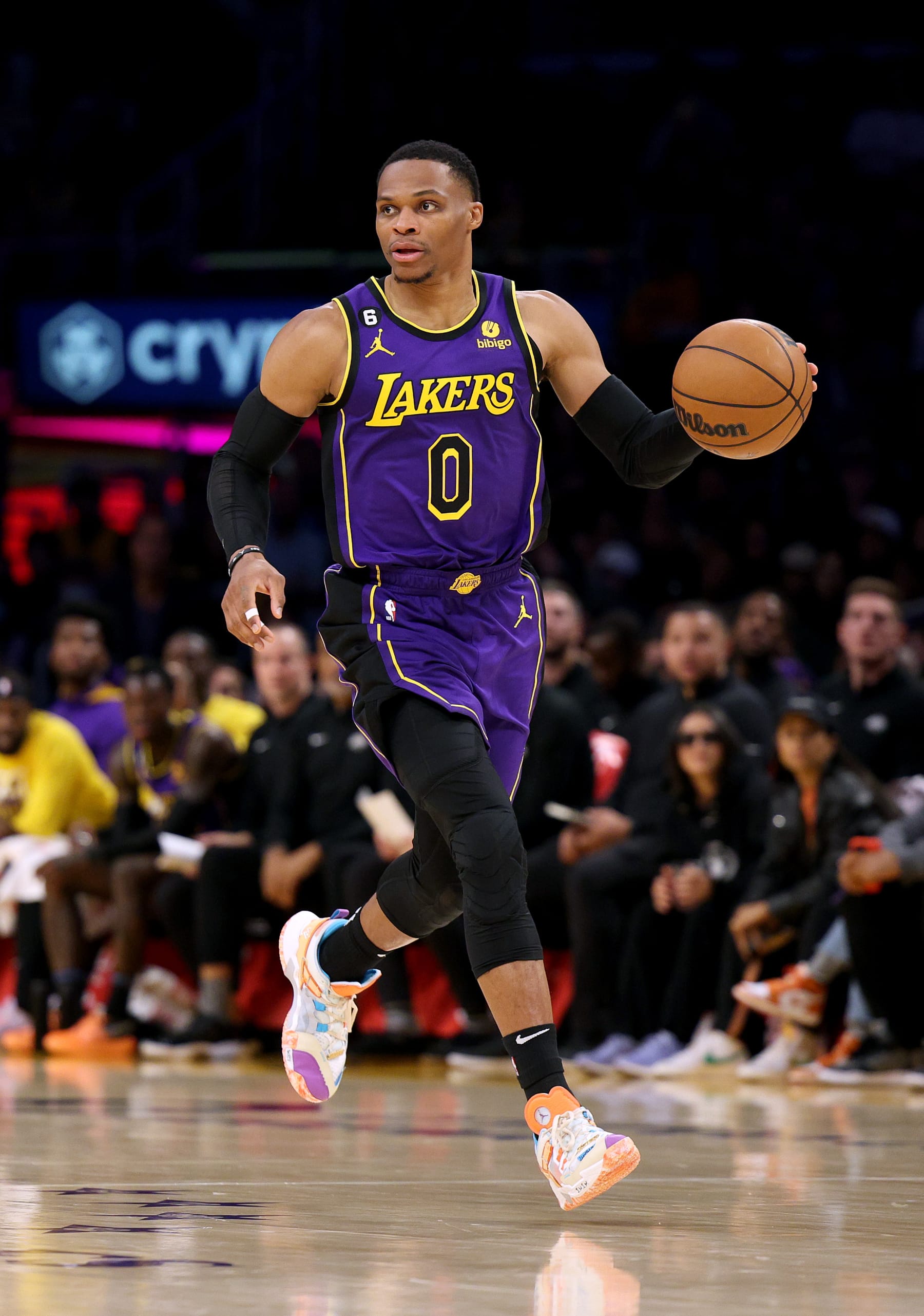LOS ANGELES, CALIFORNIA - NOVEMBER 18: Russell Westbrook #0 of the Los Angeles Lakers brings up the ball during a 128-121 Lakers win over the Detroit Pistons at Crypto.com Arena on November 18, 2022 in Los Angeles, California. NOTE TO USER: User expressly acknowledges and agrees that by downloading and/or using this Photograph, user is consenting to the terms and conditions of the Getty Images License Agreement. Mandatory Copyright Notice: Copyright 2022 NBAE. (Photo by Harry How/Getty Images)