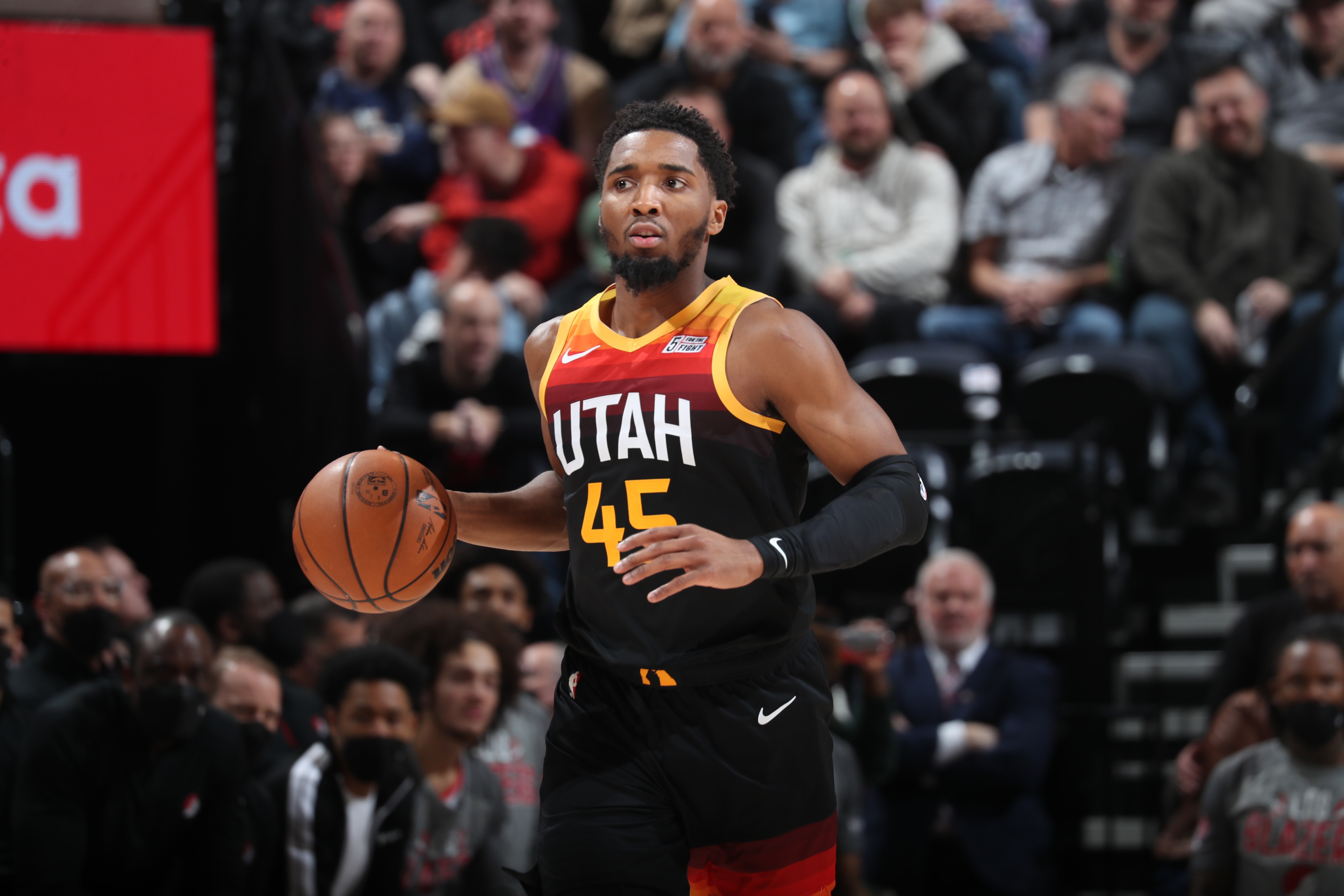SALT LAKE CITY, UT - MARCH 9: Donovan Mitchell #45 of the Utah Jazz dribbles the ball during the game against the Portland Trail Blazers on March 9, 2022 at vivint.SmartHome Arena in Salt Lake City, Utah. NOTE TO USER: User expressly acknowledges and agrees that, by downloading and or using this Photograph, User is consenting to the terms and conditions of the Getty Images License Agreement. Mandatory Copyright Notice: Copyright 2022 NBAE (Photo by Melissa Majchrzak/NBAE via Getty Images)