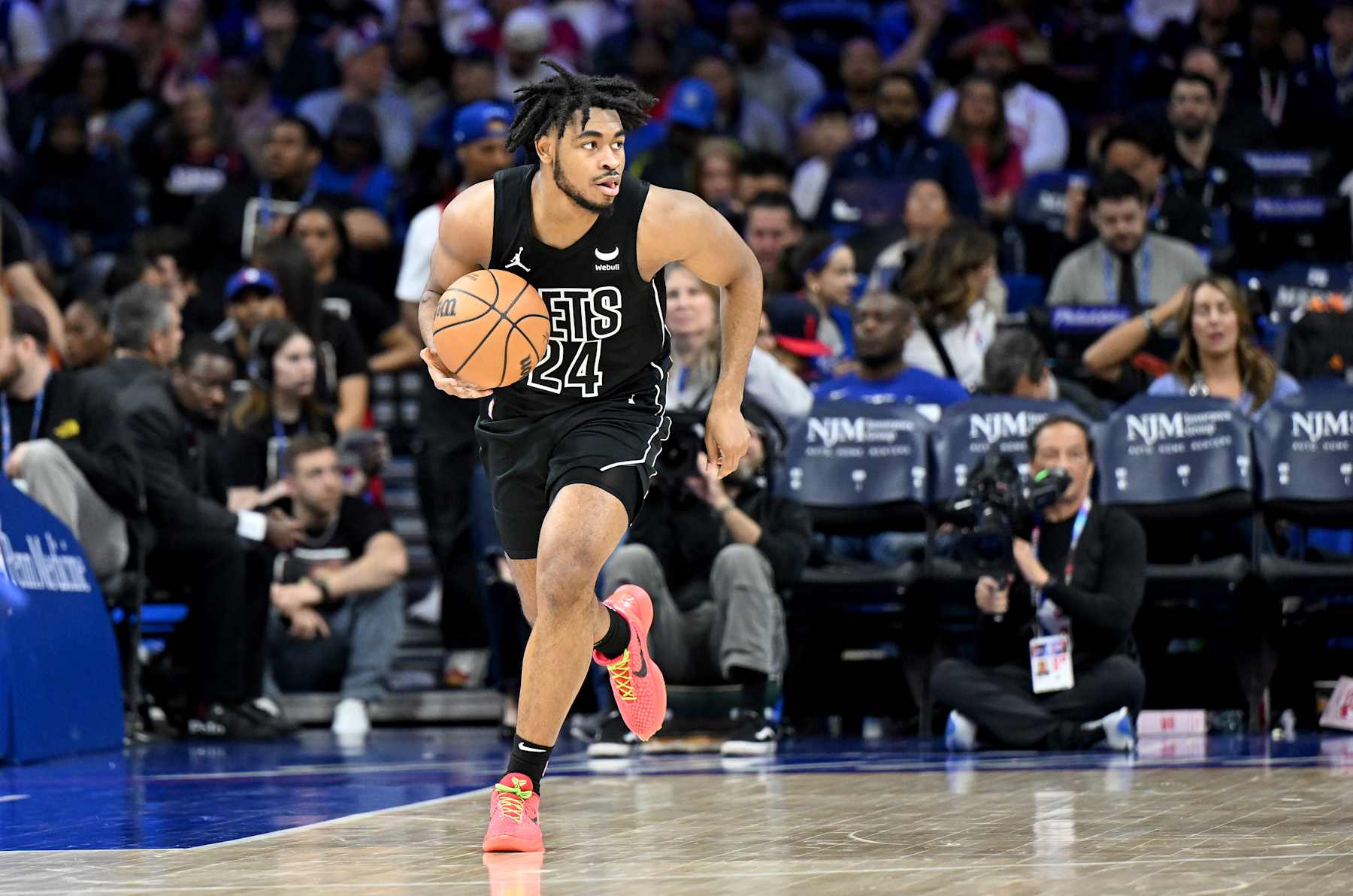 PHILADELPHIA, PENNSYLVANIA - APRIL 14: Cam Thomas #24 of the Brooklyn Nets handles the ball against the Philadelphia 76ers at the Wells Fargo Center on April 14, 2024 in Philadelphia, Pennsylvania.  NOTE TO USER: User expressly acknowledges and agrees that, by downloading and or using this photograph, User is consenting to the terms and conditions of the Getty Images License Agreement. (Photo by G Fiume/Getty Images)