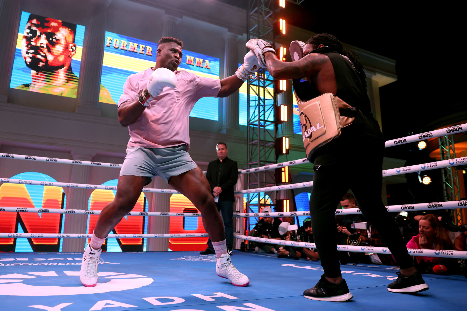 RIYADH, SAUDI ARABIA - MARCH 05: Francis Ngannou (L) trains with his trainer Dewey Cooper during a media workout ahead of the Heavyweight fight between Anthony Joshua and Francis Ngannou on the Knockout Chaos event between Anthony Joshua and Francis Ngannou, on March 05, 2024 in Riyadh, Saudi Arabia. (Photo by Richard Pelham/Getty Images)