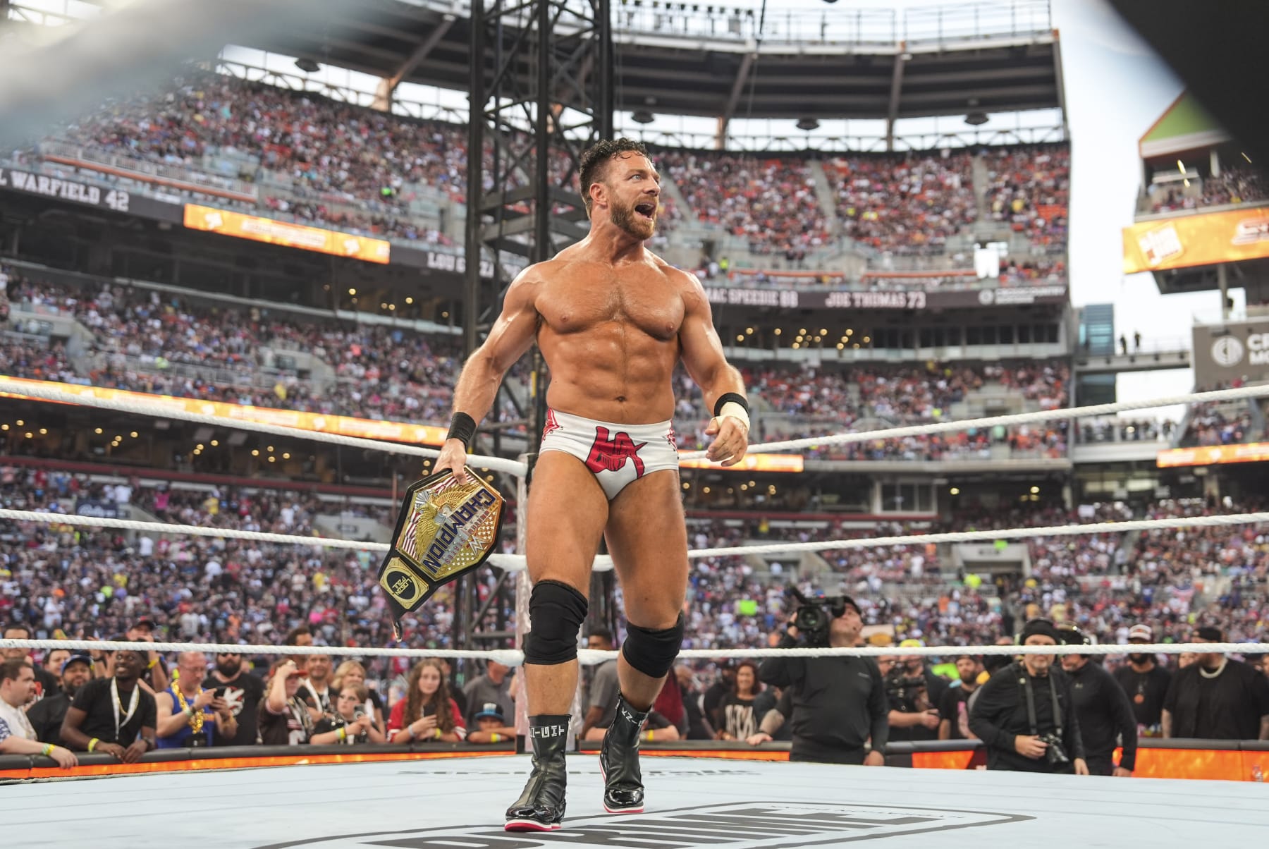 CLEVELAND, OHIO - AUGUST 03: LA Knight celebrates his US Championship win during SummerSlam at Cleveland Browns Stadium on August 3, 2024 in Cleveland, Ohio. (Photo by WWE/Getty Images)