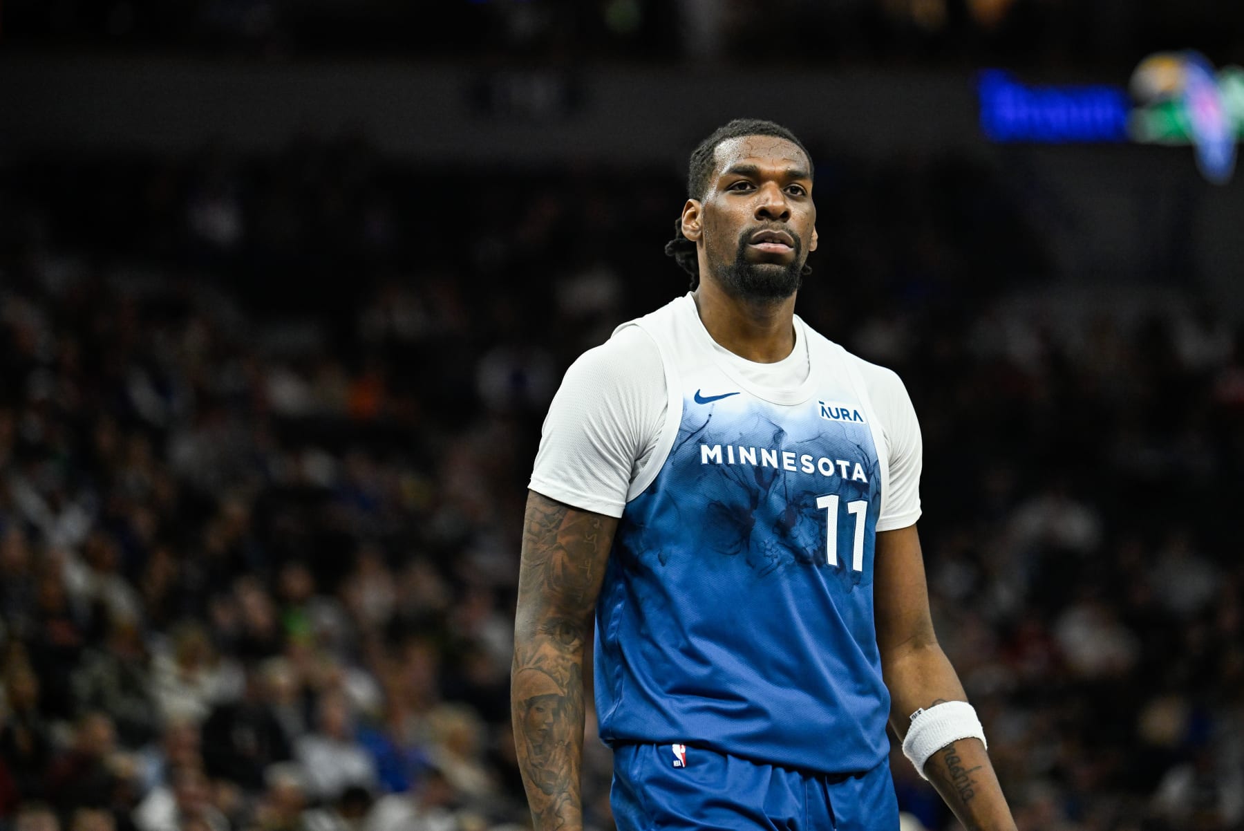 MINNEAPOLIS, MINNESOTA - APRIL 9: Naz Reid #11 of the Minnesota Timberwolves reacts after a play in the first quarter of the game against the Washington Wizards at Target Center on April 9, 2024 in Minneapolis, Minnesota. NOTE TO USER: User expressly acknowledges and agrees that, by downloading and or using this photograph, User is consenting to the terms and conditions of the Getty Images License Agreement. (Photo by Stephen Maturen/Getty Images)