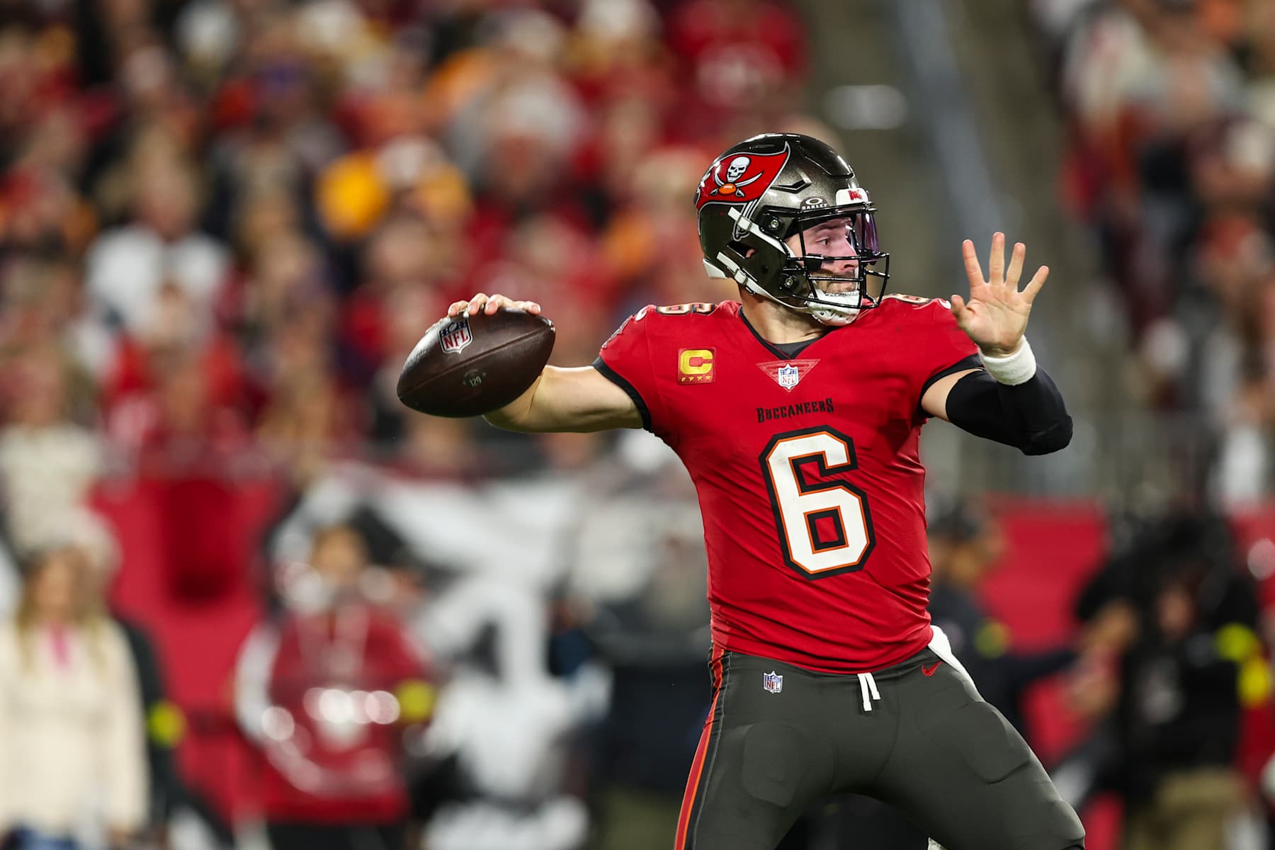 TAMPA, FLORIDA - JANUARY 12: Baker Mayfield #6 of the Tampa Bay Buccaneers throws the ball during an NFL football wild card playoff game against the Washington Commanders at Raymond James Stadium on January 12, 2025 in Tampa, Florida. (Photo by Perry Knotts/Getty Images)