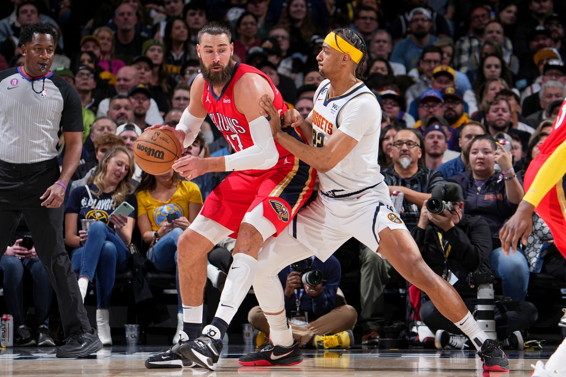 DENVER, CO - MARCH 31: Jonas Valanciunas #17 of the New Orleans Pelicans dribbles the ball during the game against the Denver Nuggets on March 31, 2023 at the Ball Arena in Denver, Colorado. NOTE TO USER: User expressly acknowledges and agrees that, by downloading and/or using this Photograph, user is consenting to the terms and conditions of the Getty Images License Agreement. Mandatory Copyright Notice: Copyright 2023 NBAE (Photo by Bart Young/NBAE via Getty Images)