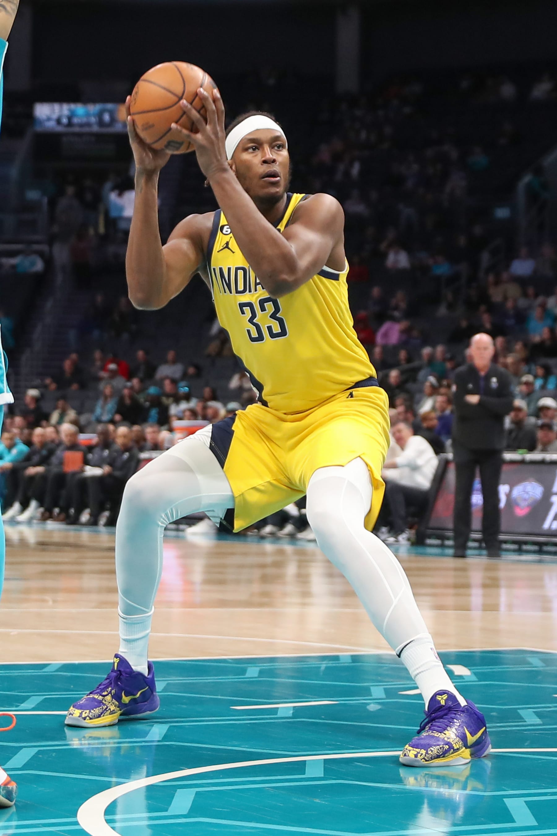 CHARLOTTE, NC - MARCH 20:  Myles Turner #33 of the Indiana Pacers goes to the basket on March 20, 2023 at Spectrum Center in Charlotte, North Carolina. NOTE TO USER: User expressly acknowledges and agrees that, by downloading and or using this photograph, User is consenting to the terms and conditions of the Getty Images License Agreement.  Mandatory Copyright Notice:  Copyright 2023 NBAE (Photo by Brock Williams-Smith/NBAE via Getty Images)