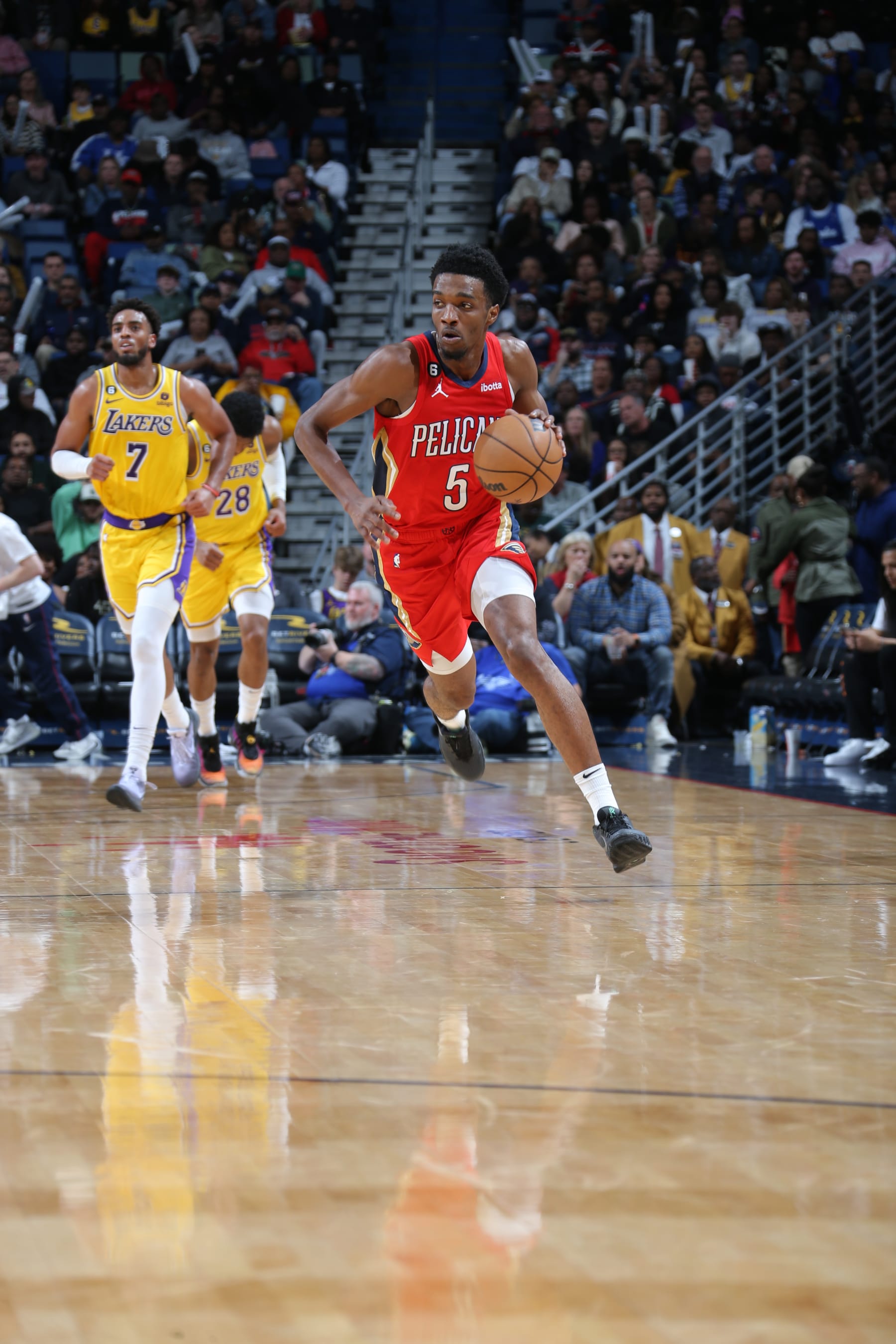 NEW ORLEANS, LA - MARCH 14: Herbert Jones #5 of the New Orleans Pelicans dribbles the ball during the game against the Los Angeles Lakers on March 14, 2023 at the Smoothie King Center in New Orleans, Louisiana. NOTE TO USER: User expressly acknowledges and agrees that, by downloading and or using this Photograph, user is consenting to the terms and conditions of the Getty Images License Agreement. Mandatory Copyright Notice: Copyright 2023 NBAE (Photo by Jonathan Bachman/NBAE via Getty Images)