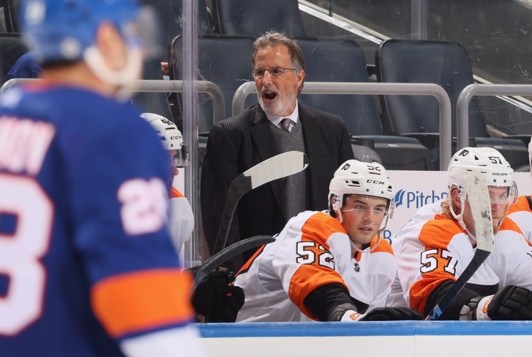 ELMONT, NEW YORK - OCTOBER 02: Head coach John Tortorella of the Philadelphia Flyers handles the bench against the New York Islanders at the UBS Arena on October 02, 2022 in Elmont, New York. (Photo by Bruce Bennett/Getty Images)
