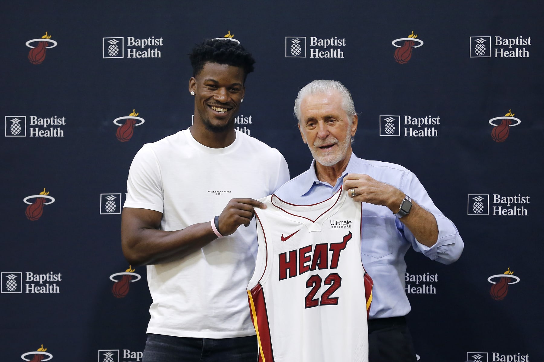 MIAMI, FLORIDA - SEPTEMBER 27:  Jimmy Butler #22 of the Miami Heat poses for a photo with president Pat Riley during his introductory press conference at American Airlines Arena on September 27, 2019 in Miami, Florida. NOTE TO USER: User expressly acknowledges and agrees that, by downloading and or using this photograph, User is consenting to the terms and conditions of the Getty Images License Agreement.  (Photo by Michael Reaves/Getty Images)