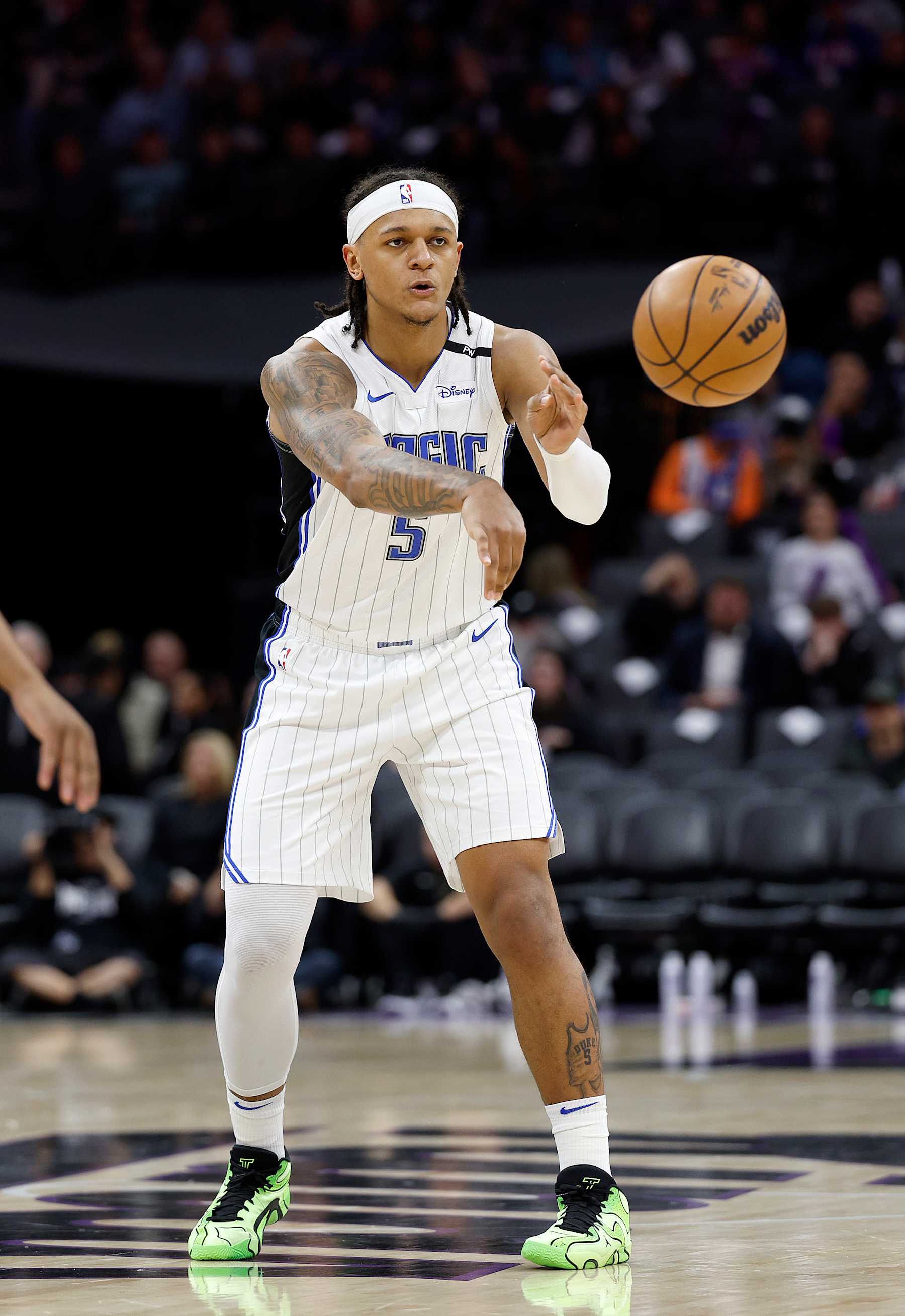 SACRAMENTO, CALIFORNIA - FEBRUARY 05: Paolo Banchero #5 of the Orlando Magic passes the ball against the Sacramento Kings during the second half of an NBA basketball game at Golden 1 Center on February 05, 2025 in Sacramento, California. NOTE TO USER: User expressly acknowledges and agrees that, by downloading and or using this photograph, User is consenting to the terms and conditions of the Getty Images License Agreement. (Photo by Thearon W. Henderson/Getty Images)