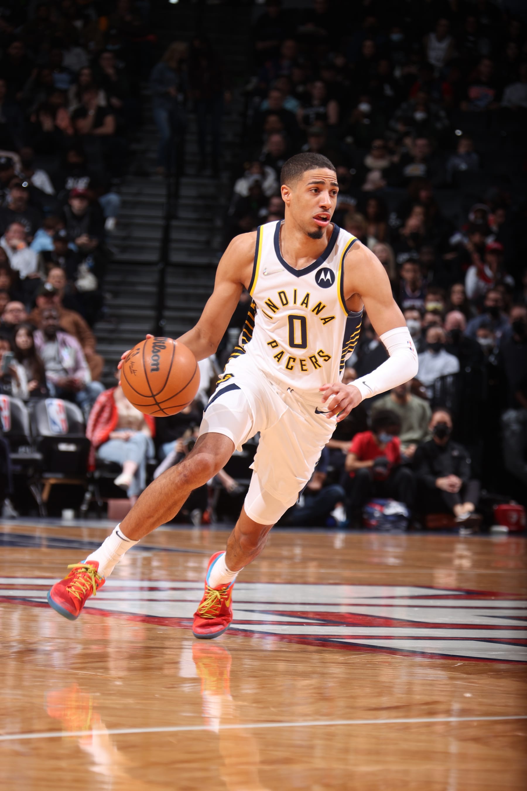 BROOKLYN, NY - APRIL 10: Tyrese Haliburton #0 of the Indiana Pacers drives to the basket during the game against the Brooklyn Nets on April 10, 2022 at Barclays Center in Brooklyn, New York. NOTE TO USER: User expressly acknowledges and agrees that, by downloading and or using this Photograph, user is consenting to the terms and conditions of the Getty Images License Agreement. Mandatory Copyright Notice: Copyright 2022 NBAE (Photo by Nathaniel S. Butler/NBAE via Getty Images)