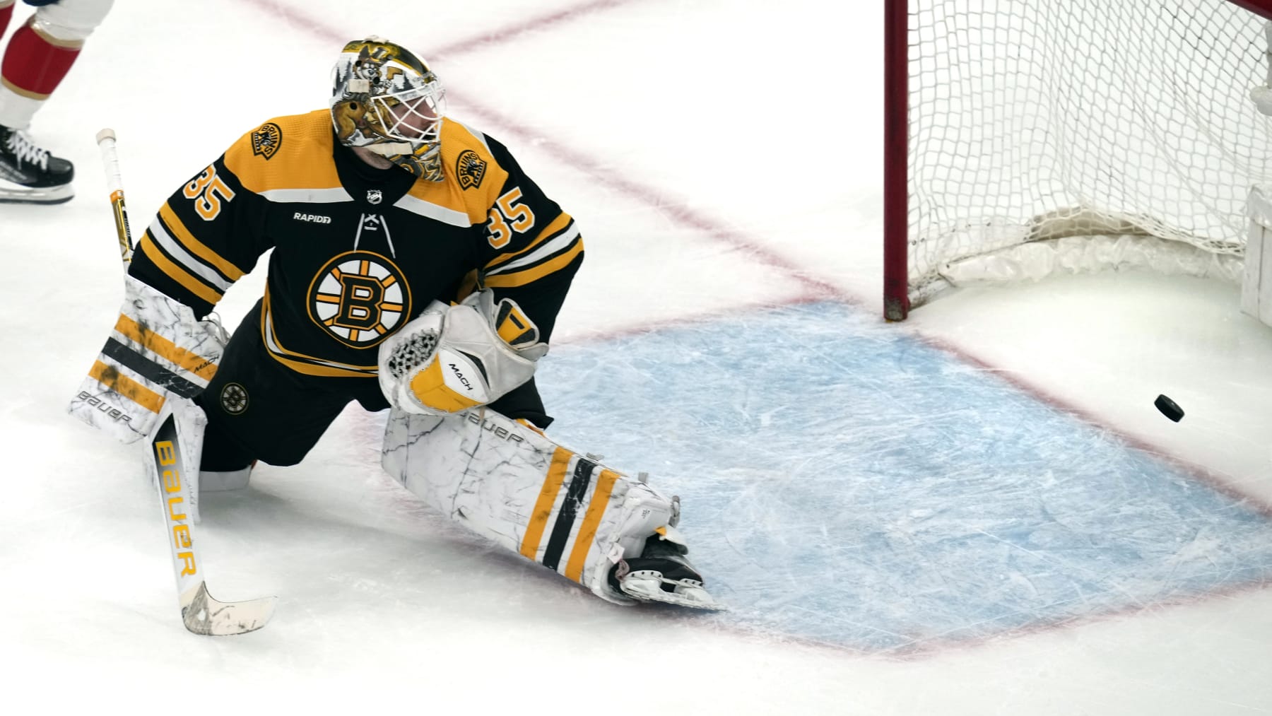 Boston Bruins goaltender Linus Ullmark looks back at the puck on a goal by Florida Panthers center Sam Bennett (9) during the second period of Game 5 in the first round of the NHL hockey playoffs, Wednesday, April 26, 2023, in Boston. (AP Photo/Charles Krupa)