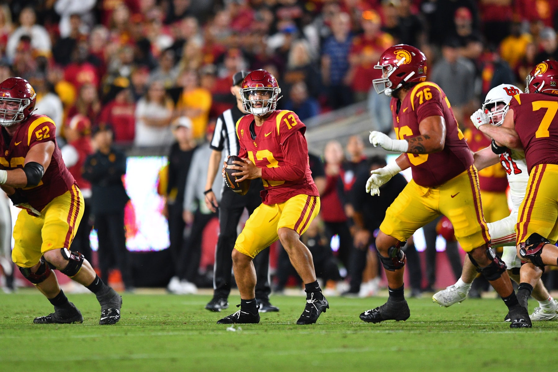 LOS ANGELES, CA - OCTOBER 21: USC Trojans quarterback Caleb Williams (13) drops back to pass during a game between the Utah Utes and the USC Trojans on October 21, 2023, at Los Angeles Memorial Coliseum in Los Angeles, CA. (Photo by Brian Rothmuller/Icon Sportswire via Getty Images)