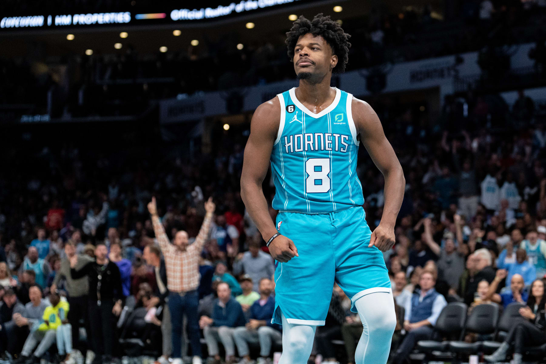 CHARLOTTE, NORTH CAROLINA - OCTOBER 21: Dennis Smith Jr. #8 of the Charlotte Hornets reacts after dunking the ball against the New Orleans Pelicans during their game at Spectrum Center on October 21, 2022 in Charlotte, North Carolina. NOTE TO USER: User expressly acknowledges and agrees that, by downloading and or using this photograph, User is consenting to the terms and conditions of the Getty Images License Agreement. (Photo by Jacob Kupferman/Getty Images)