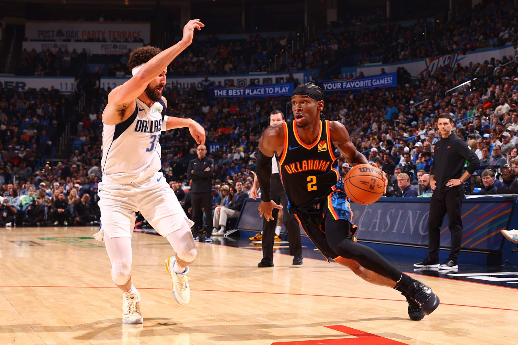 OKLAHOMA CITY, OK - NOVEMBER 17: Shai Gilgeous-Alexander #2 of the Oklahoma City Thunder dribbles the ball during the game against the Dallas Mavericks on November 17, 2024 at Paycom Center in Oklahoma City, Oklahoma. NOTE TO USER: User expressly acknowledges and agrees that, by downloading and or using this photograph, User is consenting to the terms and conditions of the Getty Images License Agreement. Mandatory Copyright Notice: Copyright 2024 NBAE (Photo by Zach Beeker/NBAE via Getty Images)