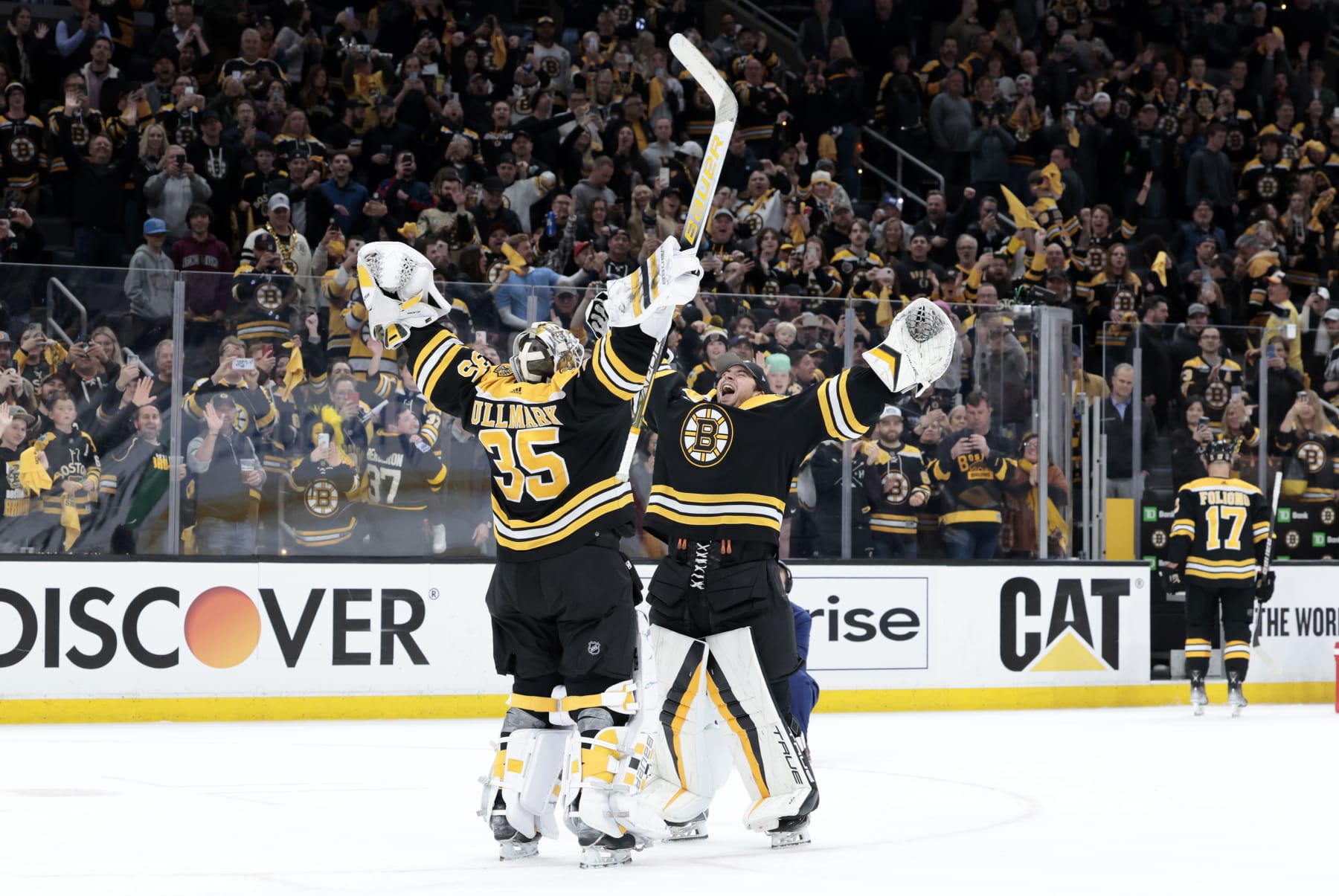 BOSTON, MA - APRIL 17: Boston Bruins goalie Linus Ullmark (35) and Boston Bruins goalie Jeremy Swayman (1) celebrate after Game 1 of an Eastern Conference First Round playoff contest between the Boston Bruins and the Florida Panthers on April 17, 2023, at TD Garden in Boston, Massachusetts. (Photo by Fred Kfoury III/Icon Sportswire via Getty Images)