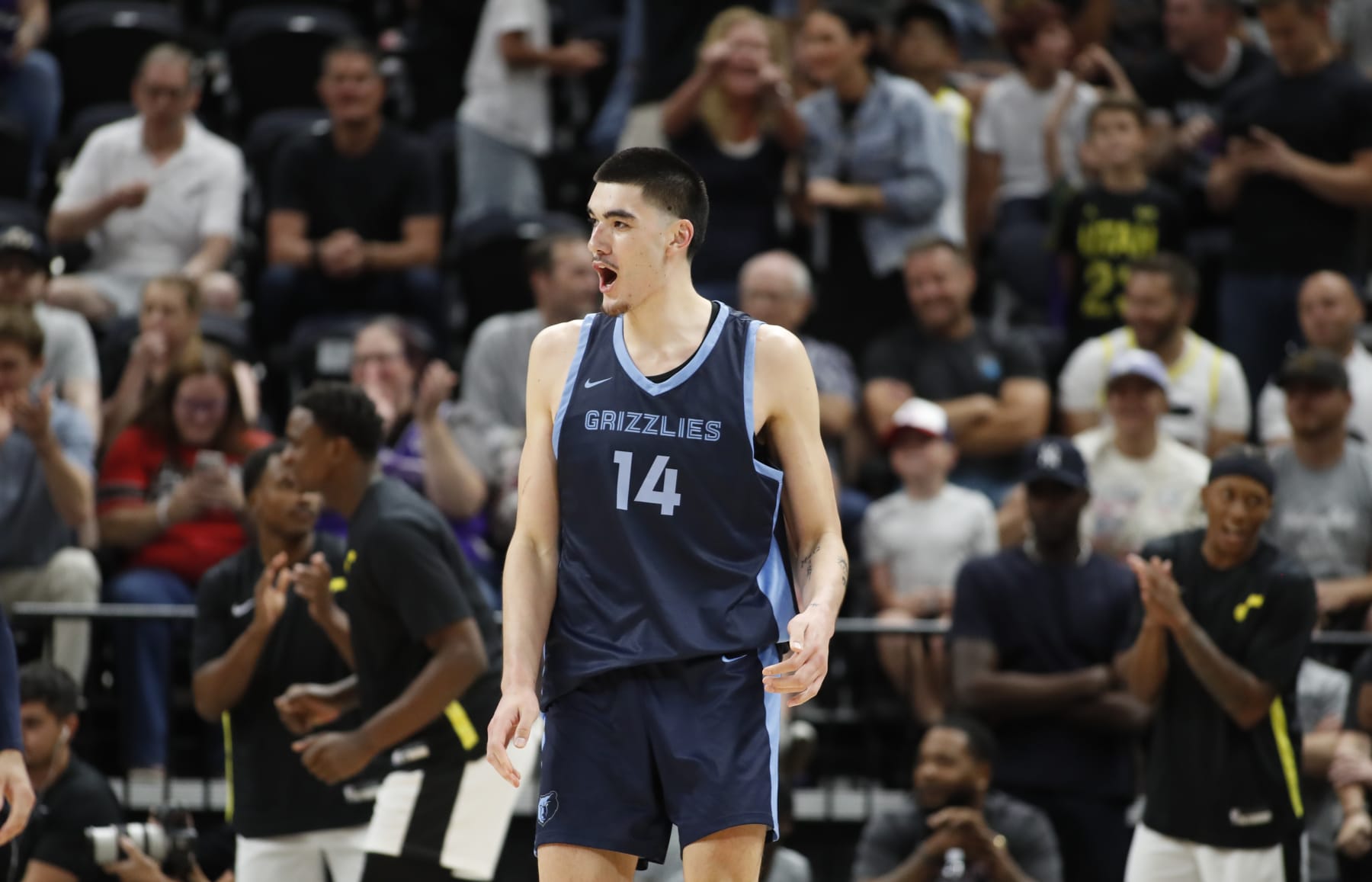 SALT LAKE CITY, UT - JULY 08: Zack Edey #14 of the Memphis Grizzlies react to an officials call and during the second half of their NBA Summer League game against the Utah Jazz at the Delta Center on July 8, 2024 in Salt Lake City, Utah. NOTE TO USER: User expressly acknowledges and agrees that, by downloading and or using this photographer, user is consenting to the terms and conditions of Getty Images License Agreement.(Photo by Chris Gardner/Getty Images)