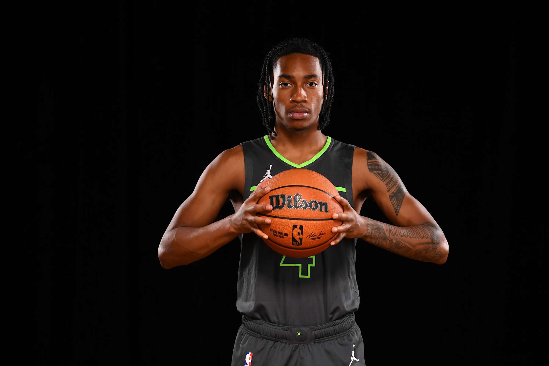 LAS VEGAS, NV - JULY 17:  Rob Dillingham #4 of the Minnesota Timberwolves poses for a portrait during the 2024 NBA Rookie Photo Shoot on July 17, 2024 at the University of Nevada, Las Vegas campus in Las Vegas, Nevada. NOTE TO USER: User expressly acknowledges and agrees that, by downloading and/or using this Photograph, user is consenting to the terms and conditions of the Getty Images License Agreement. Mandatory Copyright Notice: Copyright 2024 NBAE (Photo by Brian Babineau/NBAE via Getty Images)