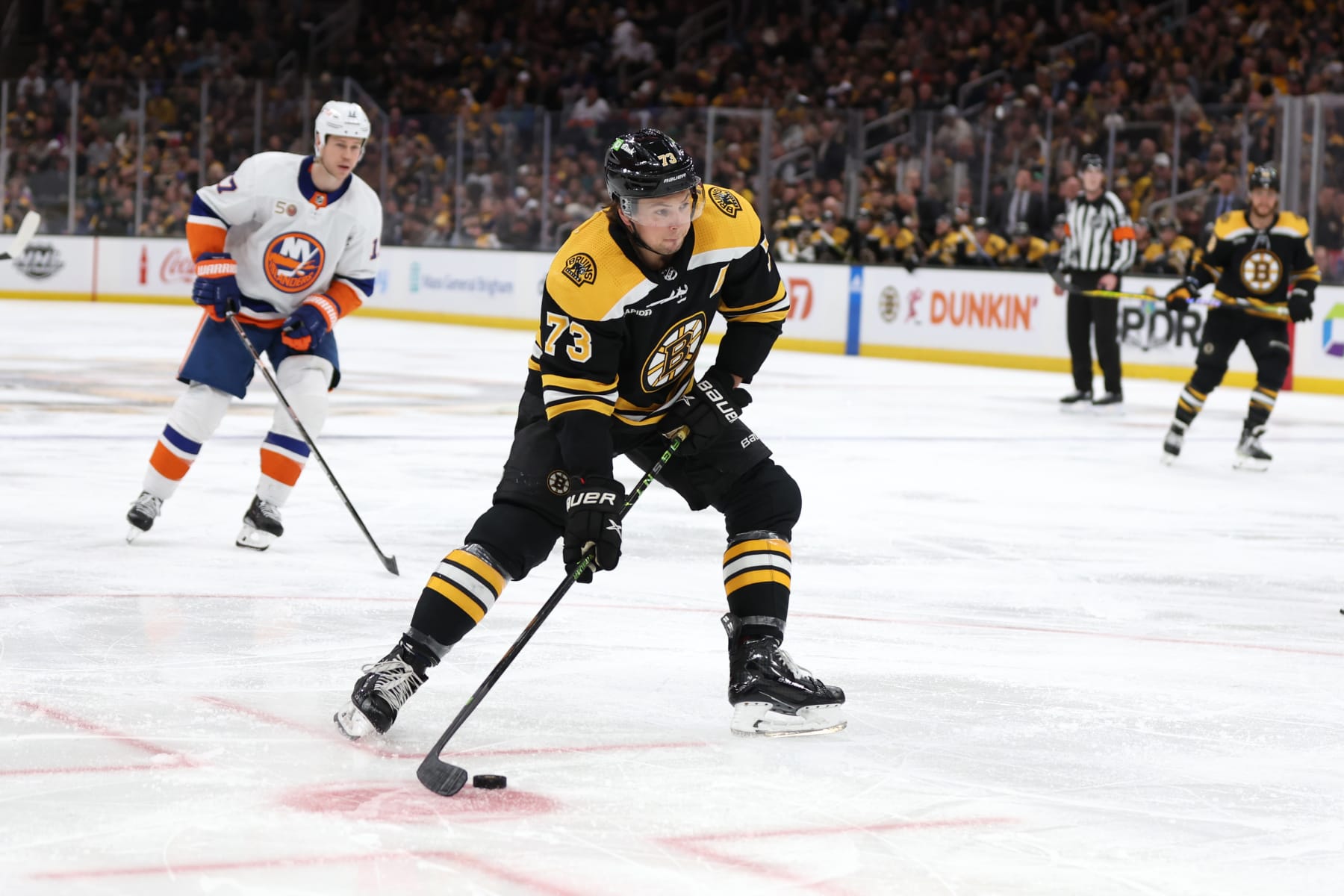 BOSTON, MASSACHUSETTS - FEBRUARY 18: Charlie McAvoy #73 of the Boston Bruins skates against the New York Islanders during the third period at TD Garden on February 18, 2023 in Boston, Massachusetts. The Bruins defeat the Islanders 6-2.  (Photo by Maddie Meyer/Getty Images)