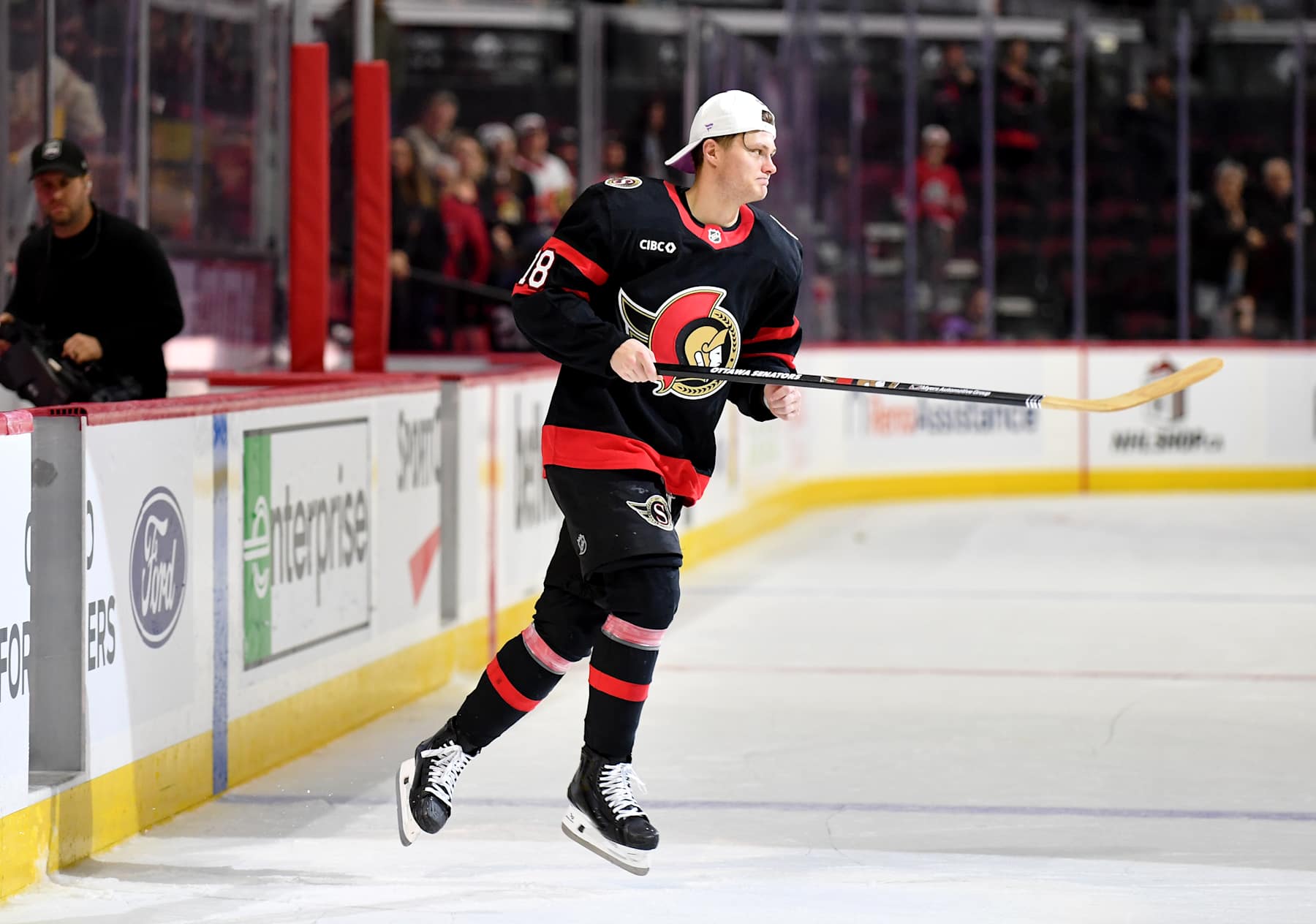 OTTAWA, ONTARIO - DECEMBER 07: Tim Stützle #18 of the Ottawa Senators skates onto the ice after being announced second star of the game in win over the Nashville Predators at Canadian Tire Centre on December 07, 2024 in Ottawa, Ontario. (Photo by Troy Parla/Getty Images)