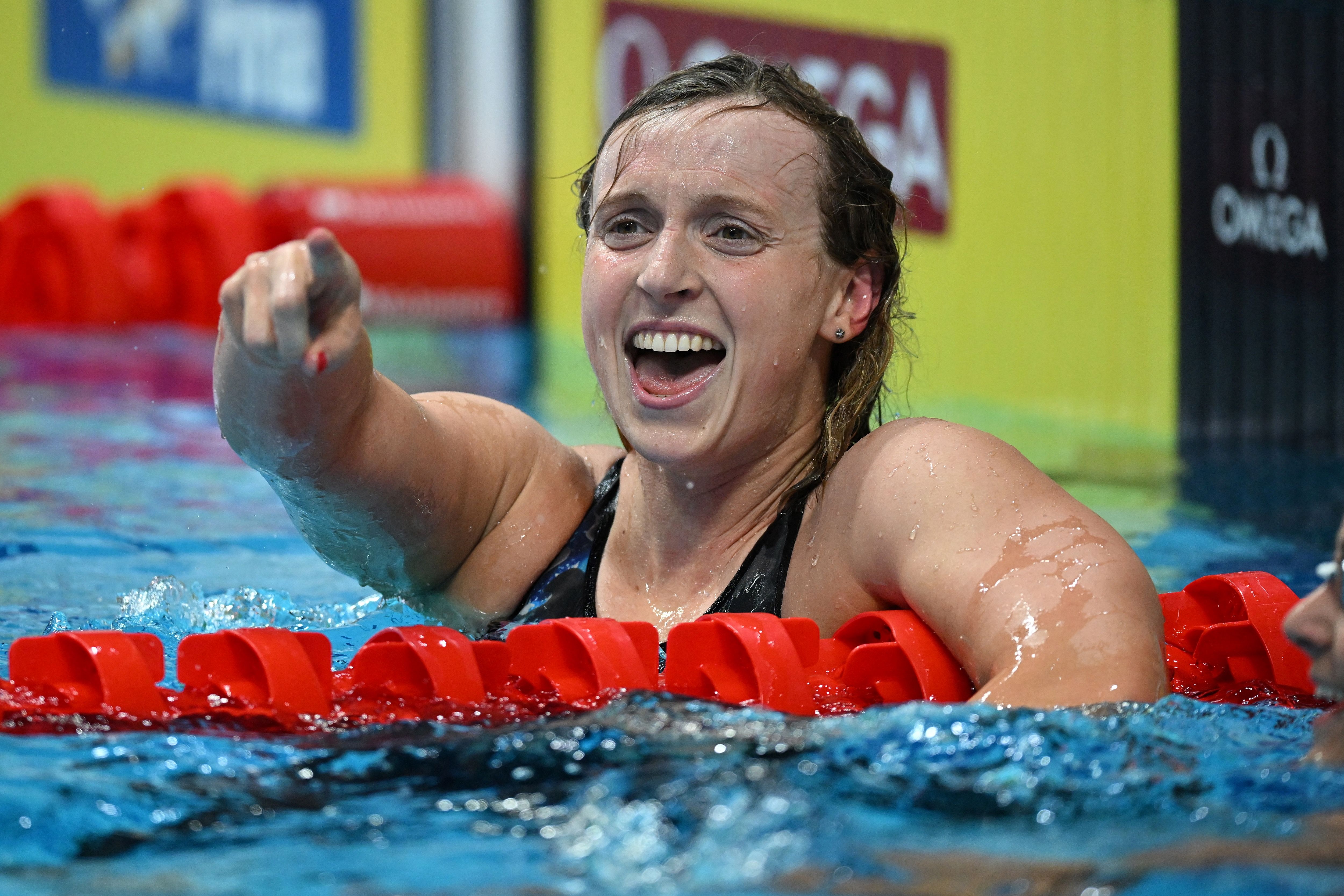 USA's Katie Ledecky reacts after taking gold in the women's 1500m freestyle finals during the Budapest 2022 World Aquatics Championships at Duna Arena in Budapest on June 20, 2022. (Photo by Ferenc ISZA / AFP) (Photo by FERENC ISZA/AFP via Getty Images)
