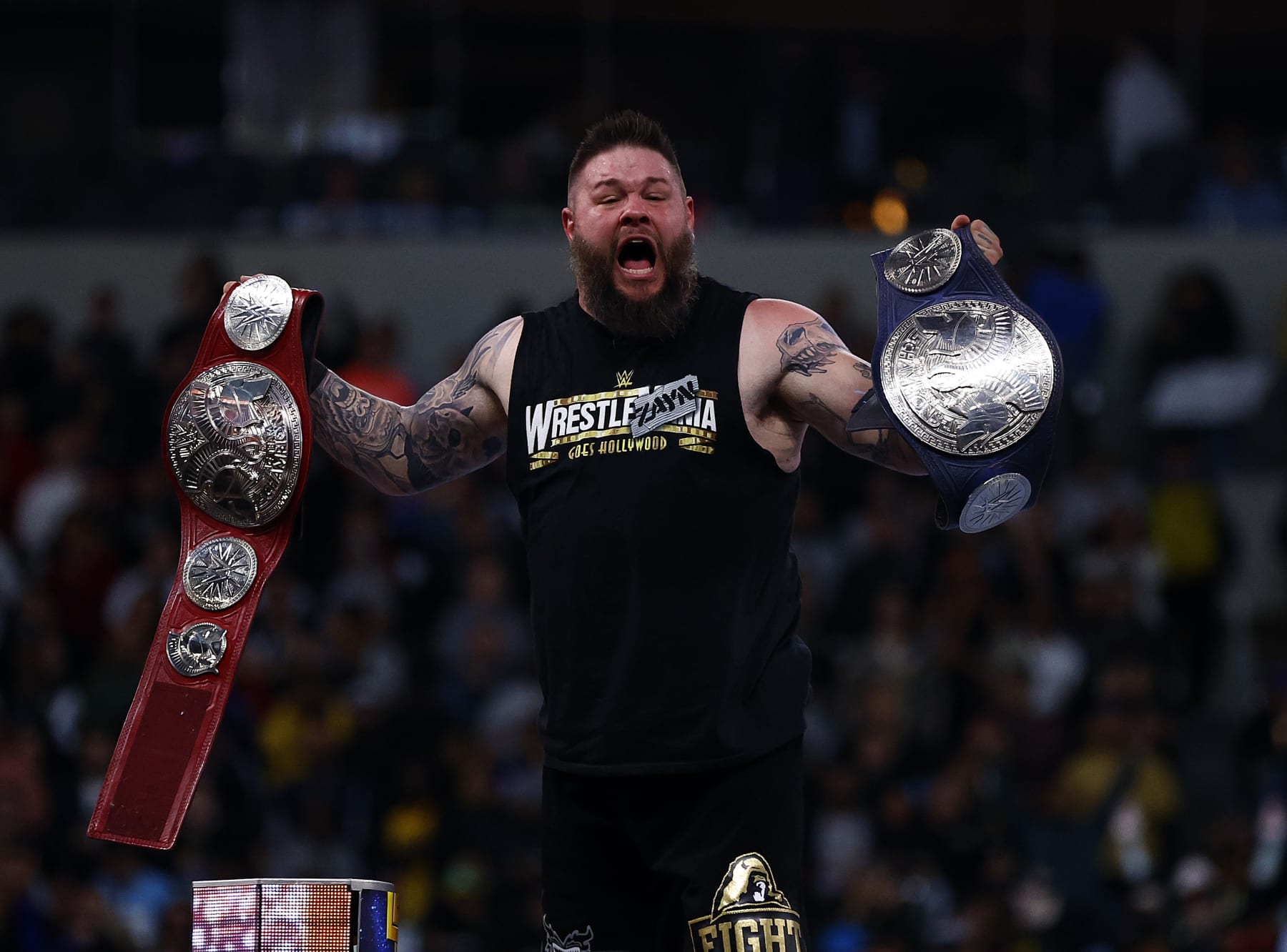 INGLEWOOD, CALIFORNIA - APRIL 01: Kevin Owens and Sami Zayn after defeating The Usos for the Undisputed WWE tag team championship during WrestleMania Goes Hollywood at SoFi Stadium on April 01, 2023 in Inglewood, California. (Photo by Ronald Martinez/Getty Images)