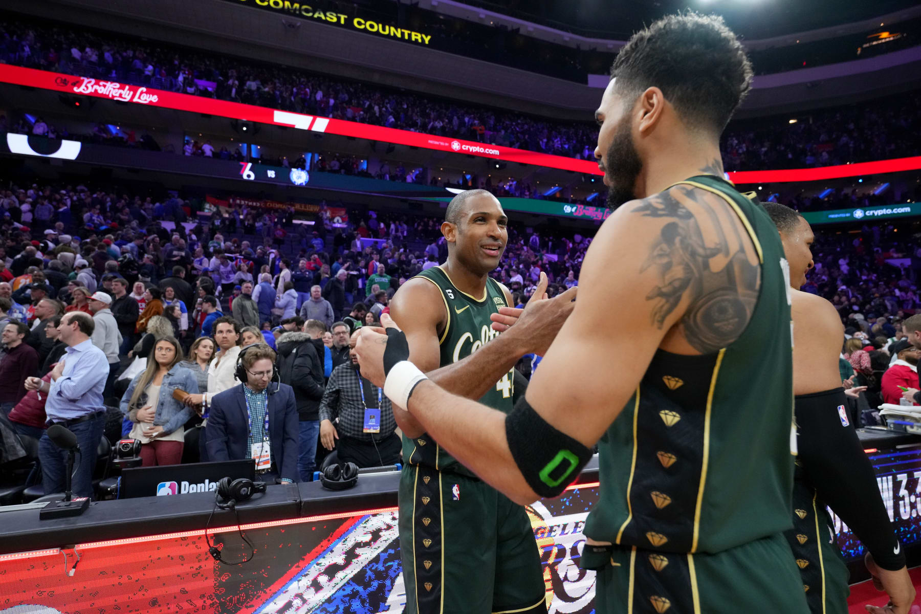 PHILADELPHIA, PA - FEBRUARY 25: Al Horford #42 of the Boston Celtics congratulates Jayson Tatum #0 of the Boston Celtics after scoring the game winning basket after the game against the Philadelphia 76ers on February 25, 2023 at the Wells Fargo Center in Philadelphia, Pennsylvania NOTE TO USER: User expressly acknowledges and agrees that, by downloading and/or using this Photograph, user is consenting to the terms and conditions of the Getty Images License Agreement. Mandatory Copyright Notice: Copyright 2023 NBAE (Photo by Jesse D. Garrabrant/NBAE via Getty Images)