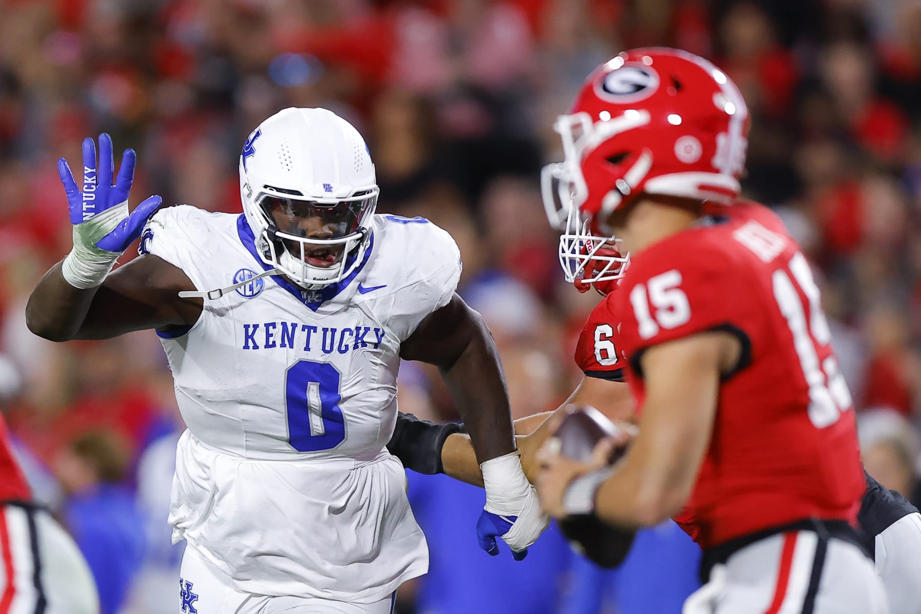 ATHENS, GEORGIA - OCTOBER 7: Deone Walker #0 of the Kentucky Wildcats busts through the line against the Georgia Bulldogs offense during the first quarter at Sanford Stadium on October 7, 2023 in Athens, Georgia. (Photo by Todd Kirkland/Getty Images)