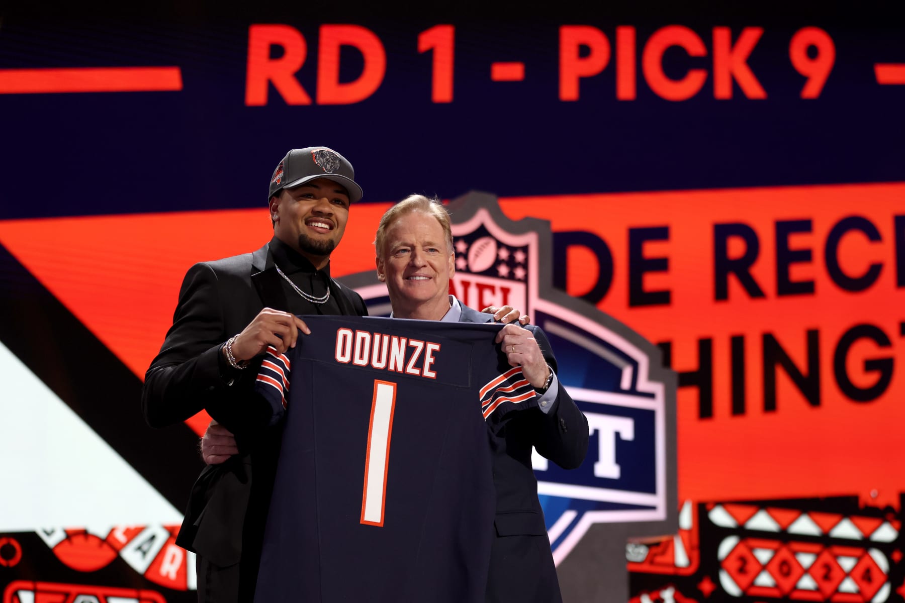 New Bears WR Rome Odunze and NFL Commissioner Roger Goodell 