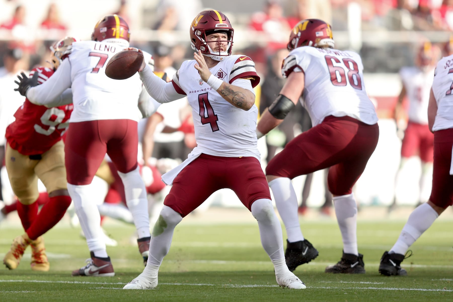 SANTA CLARA, CALIFORNIA - DECEMBER 24: Taylor Heinicke #4 of the Washington Commanders throws the ball during the first half in the game against the San Francisco 49ers at Levi's Stadium on December 24, 2022 in Santa Clara, California. (Photo by Lachlan Cunningham/Getty Images)