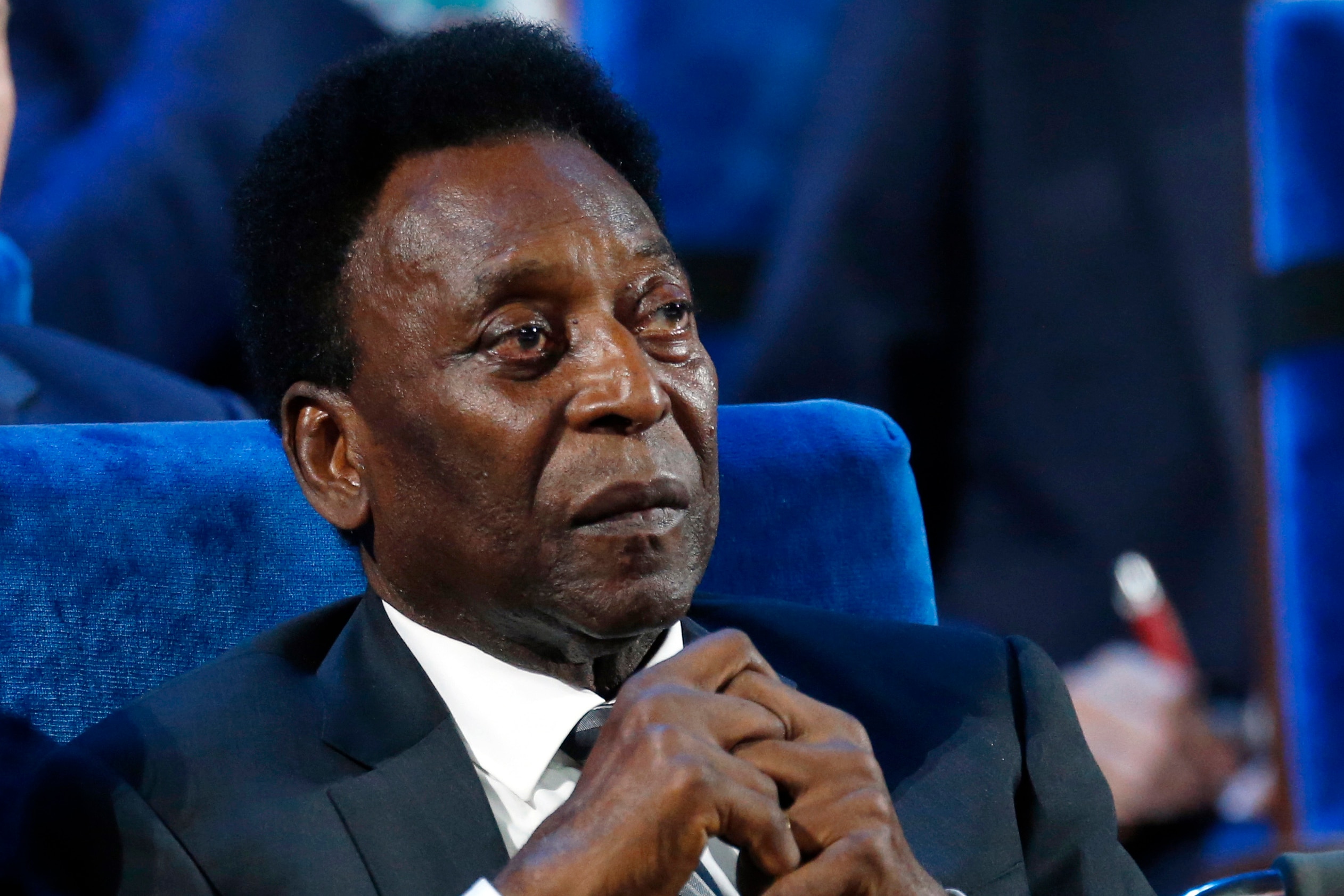 FILE - Brazilian Pele attends the 2018 soccer World Cup draw at the Kremlin in Moscow, Dec. 1, 2017. Pele was hospitalized once more in Sao Paulo to continue his colon tumor treatment. Hospital Albert Einstein said in a statement on Wednesday, Dec. 8, 2021, that the 81-year-old soccer legend is “stable and expected to be released in the next few days.” (AP Photo/Alexander Zemlianichenko, File)