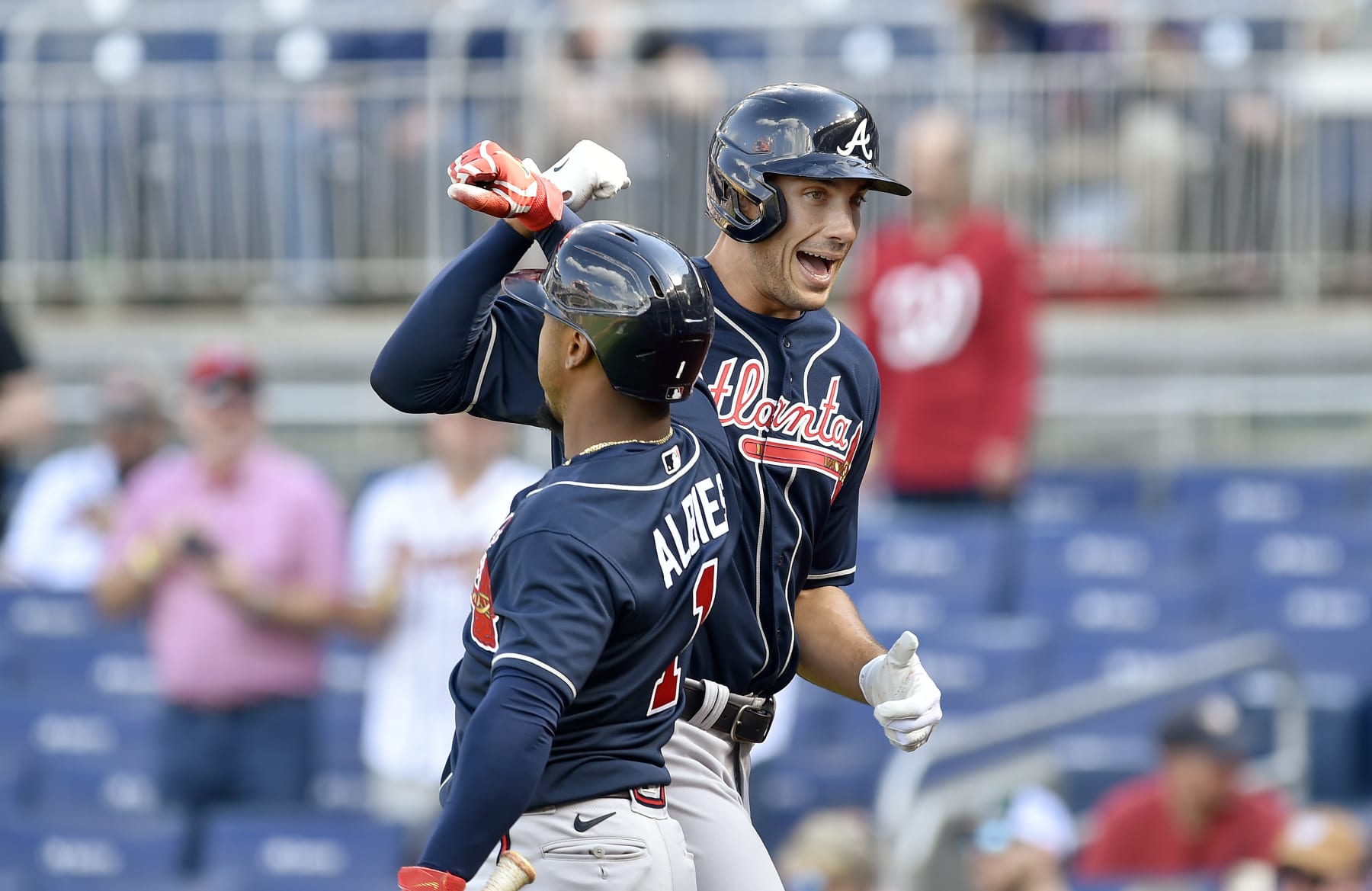 WASHINGTON, DC - APRIL 01: Atlanta Braves first baseman Matt Olsen (28) celebrates with second baseman Ozzie Albies (1) after his first inning home run during the Atlanta Braves versus Washington Nationals MLB game at Nationals Park on April 1, 2023 in Washington, D.C.. (Photo by Randy Litzinger/Icon Sportswire via Getty Images)